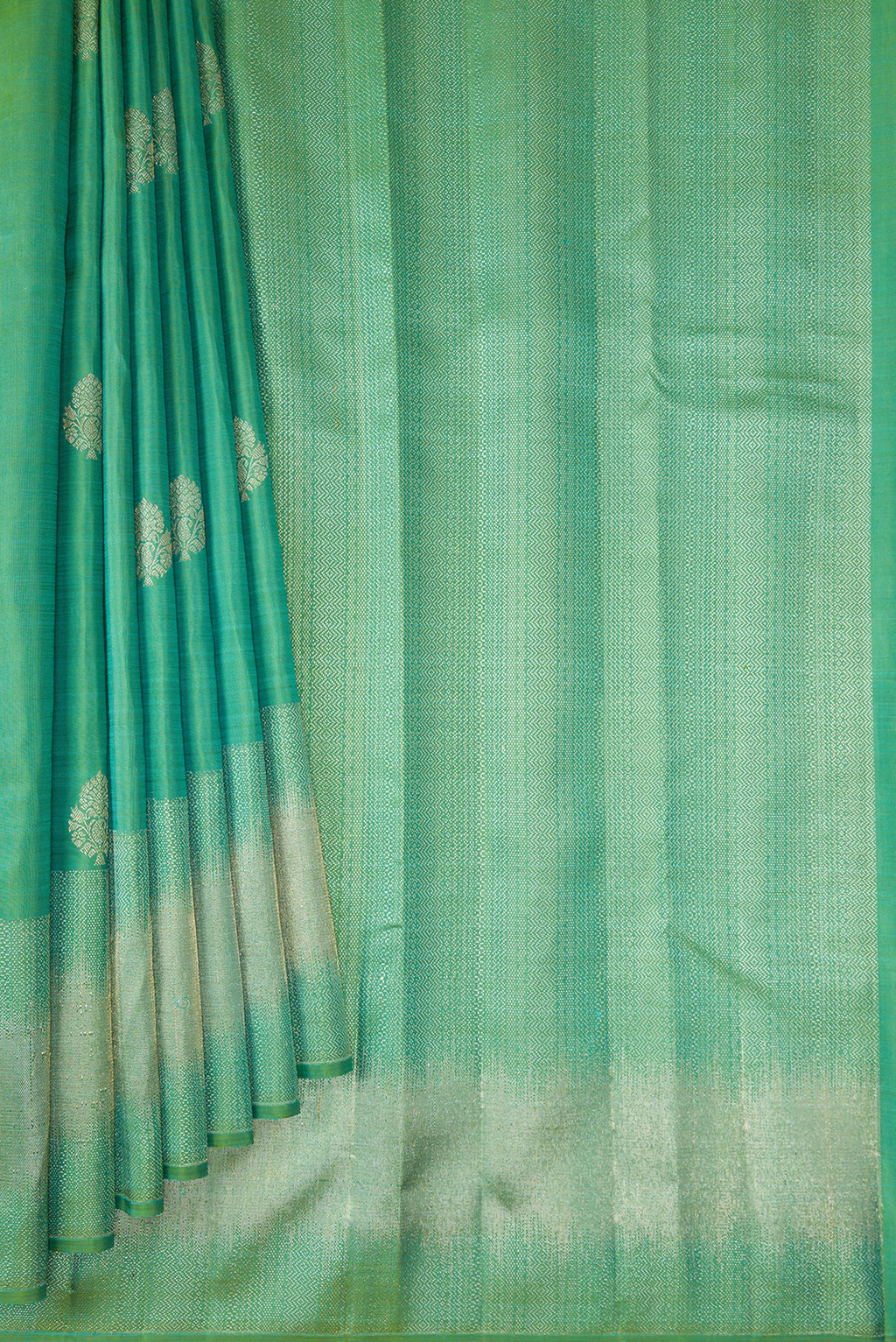 Pleats and pallu of Sea Green Kanjivaram Silk Saree with Zari Butta on the body and Fancy Border. 
