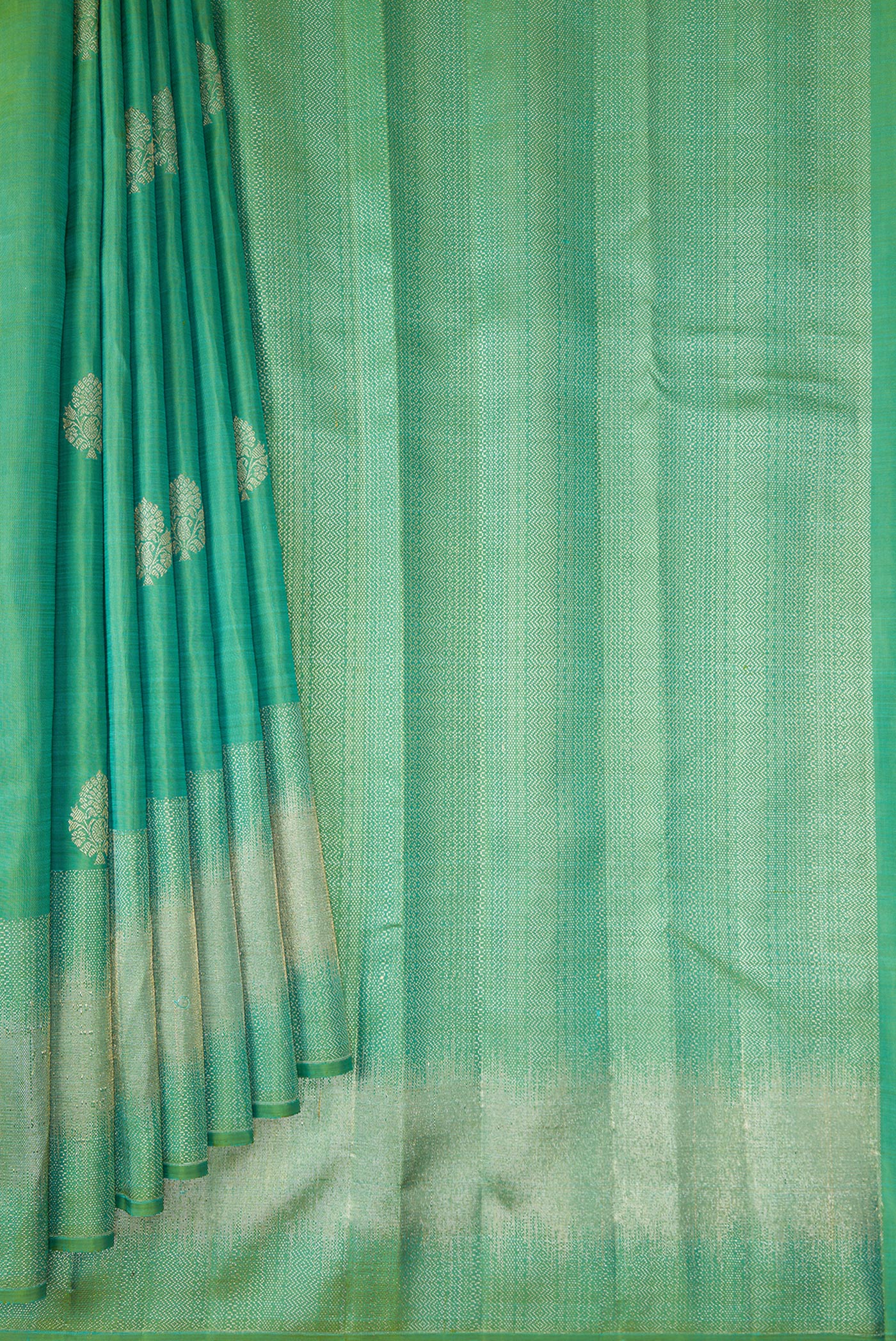 Pleats and pallu of Sea Green Kanjivaram Silk Saree with Zari Butta on the body and Fancy Border. 
