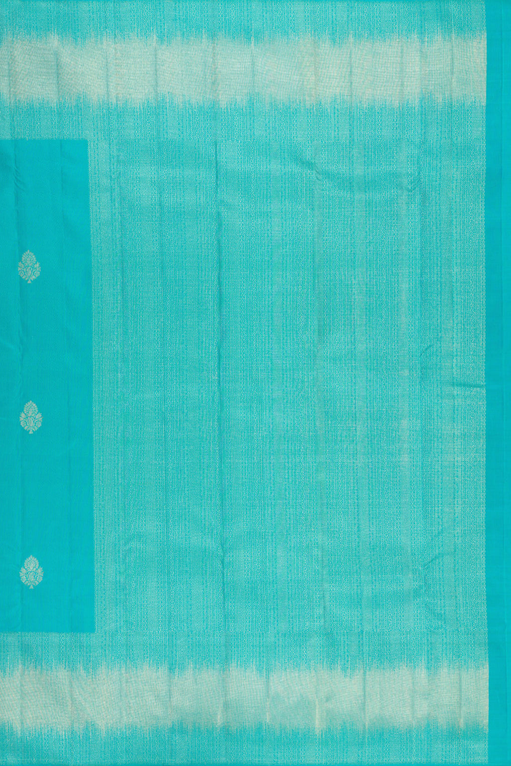 Close up image of the pallu of Sky Blue Kanjivaram Silk Saree with Zari Butta on the body and Fancy Border. 