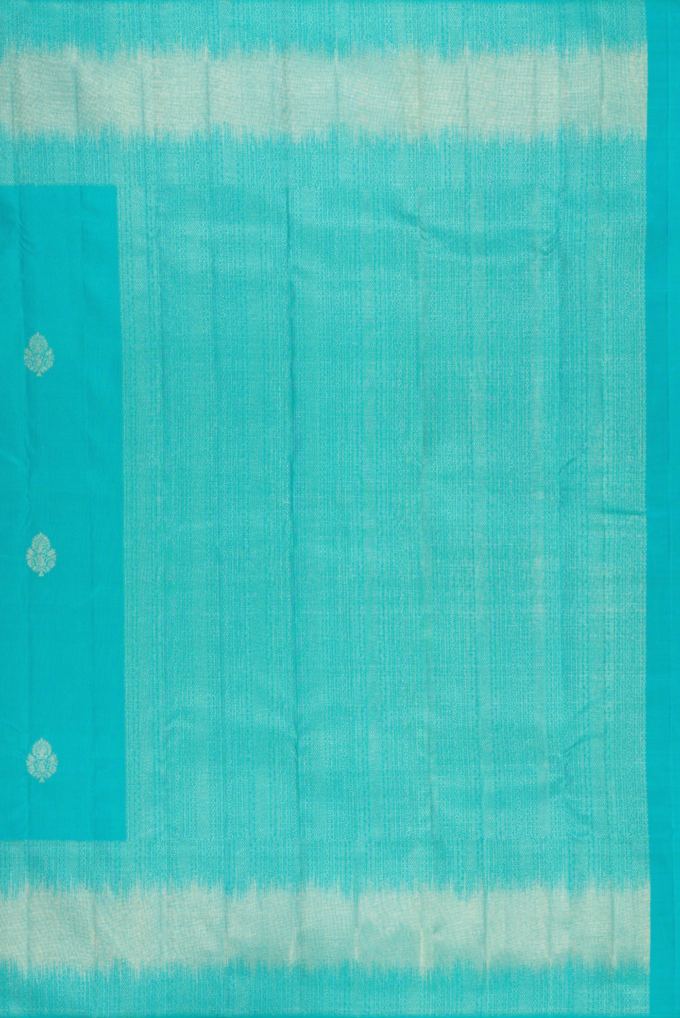 Close up image of the pallu of Sky Blue Kanjivaram Silk Saree with Zari Butta on the body and Fancy Border. 