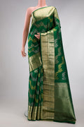 Green Kanchipuram Silk Saree with Zari Brocade on the body and Zari Border.  displayed on a mannequin