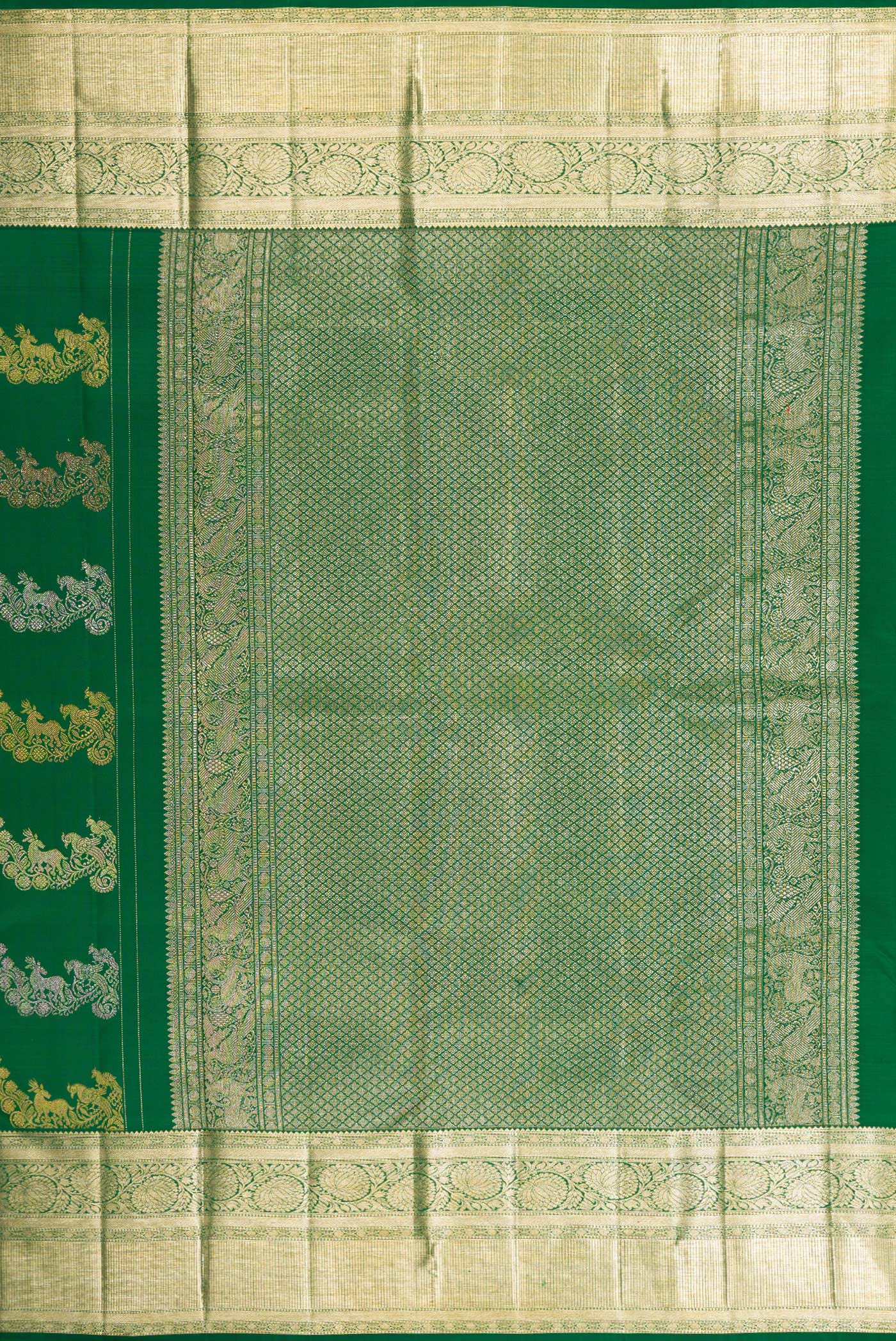 Close up image of the pallu of Green Kanchipuram Silk Saree with Zari Brocade on the body and Zari Border. 