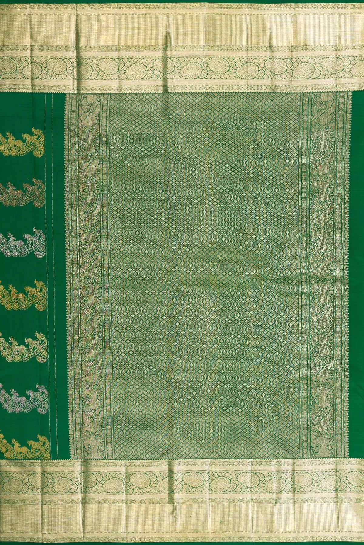 Close up image of the pallu of Green Kanchipuram Silk Saree with Zari Brocade on the body and Zari Border. 