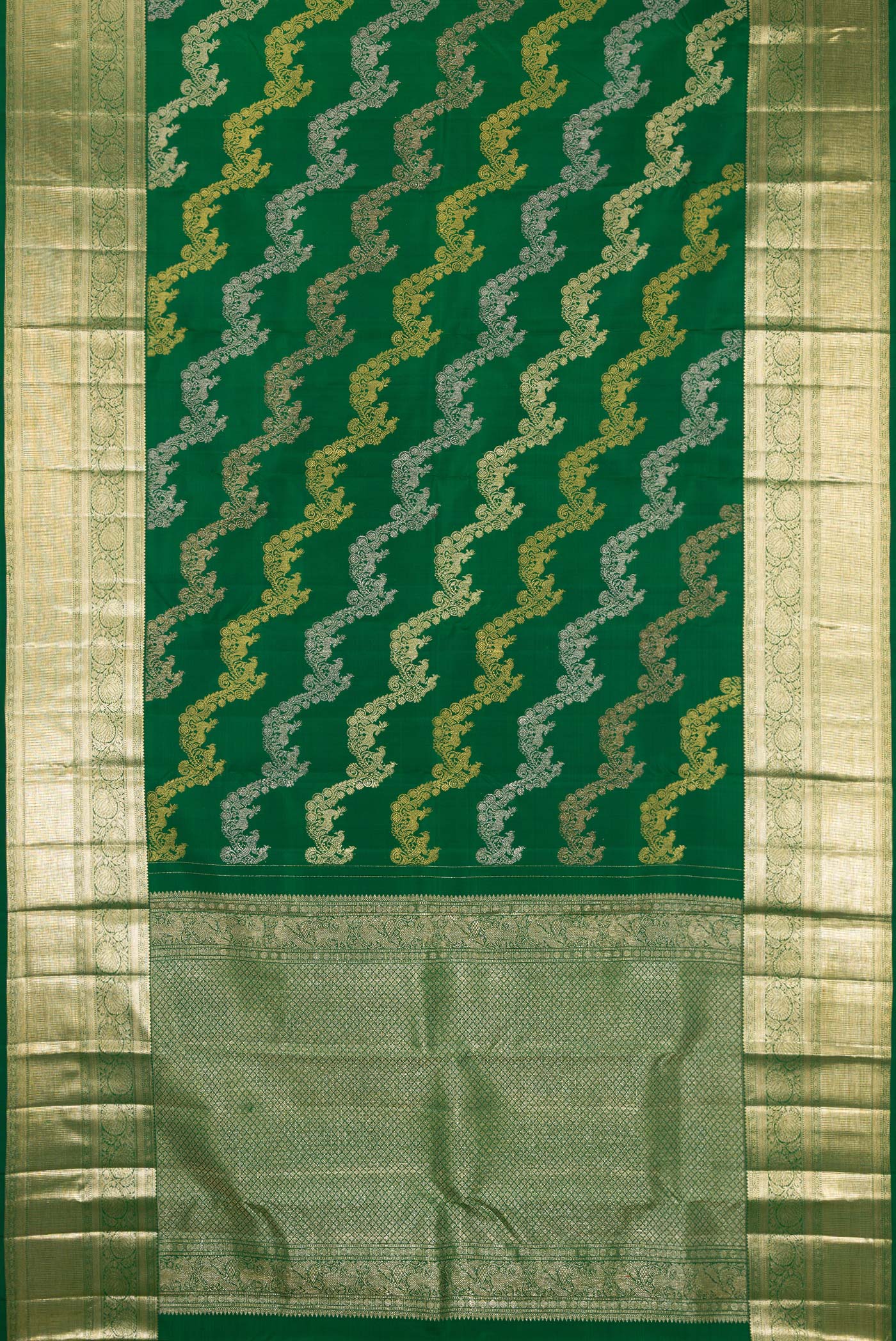Flat view of Green Kanchipuram Silk Saree with Zari Brocade on the body and Zari Border. 
