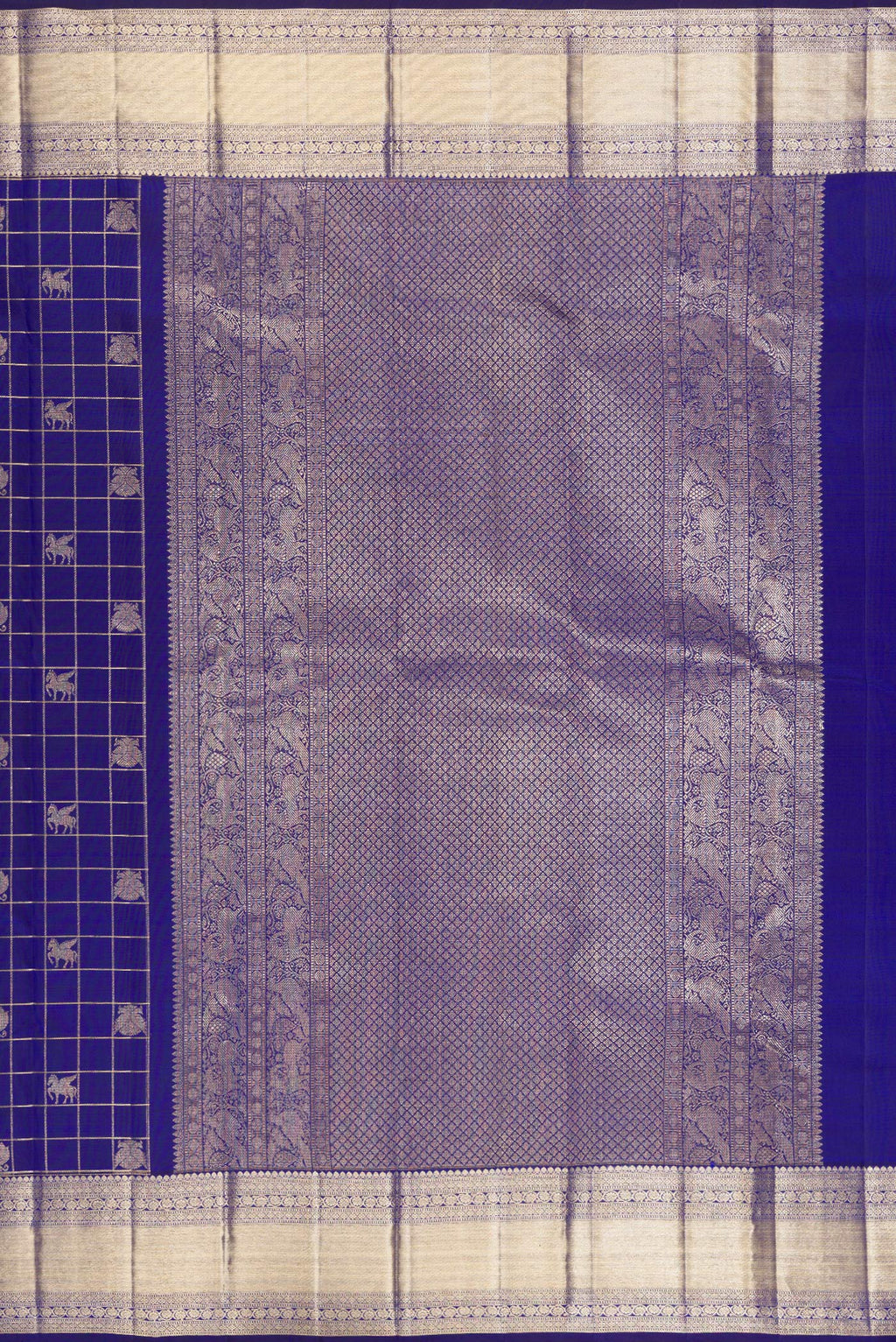 Close up image of the pallu of Royal Blue Kanchipuram Silk Saree with Checked design on the body and Zari Border. 