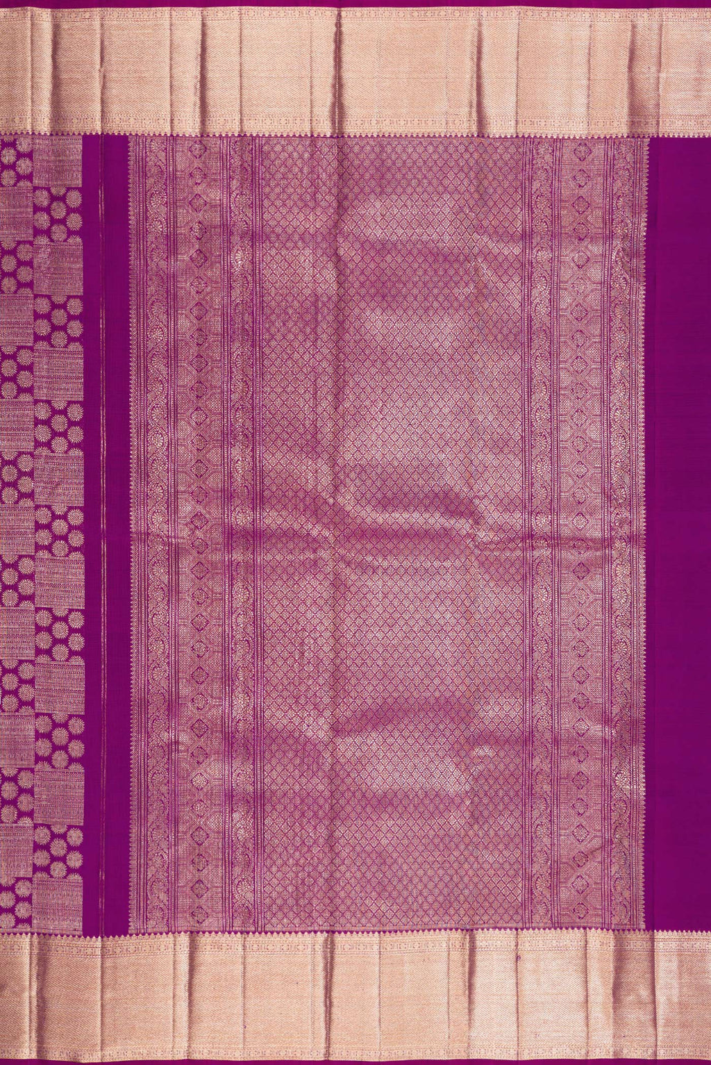 Close up image of the pallu of Purple Kanchipuram Silk Saree with Zari Brocade on the body and Zari Border. 
