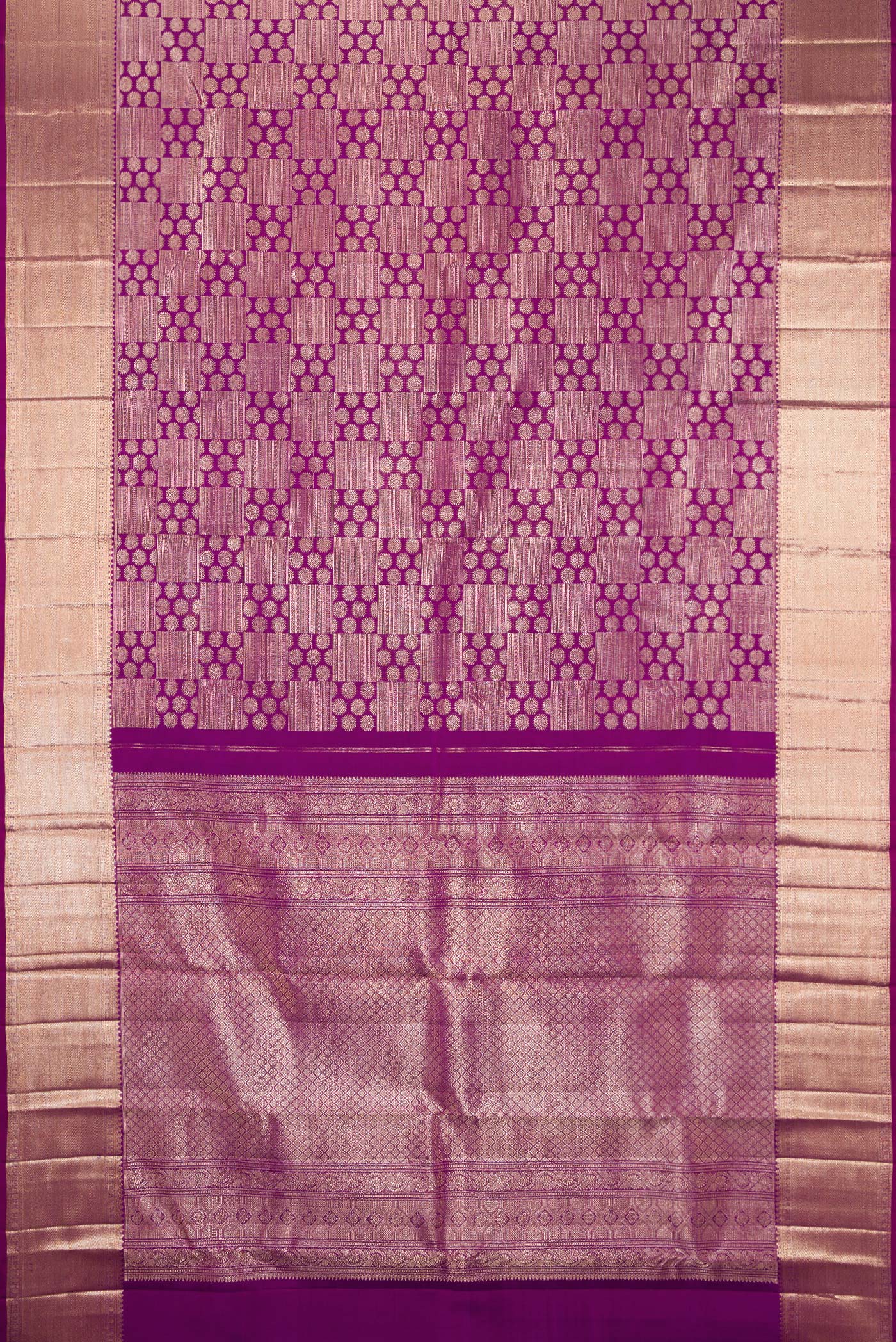 Flat view of Purple Kanchipuram Silk Saree with Zari Brocade on the body and Zari Border. 