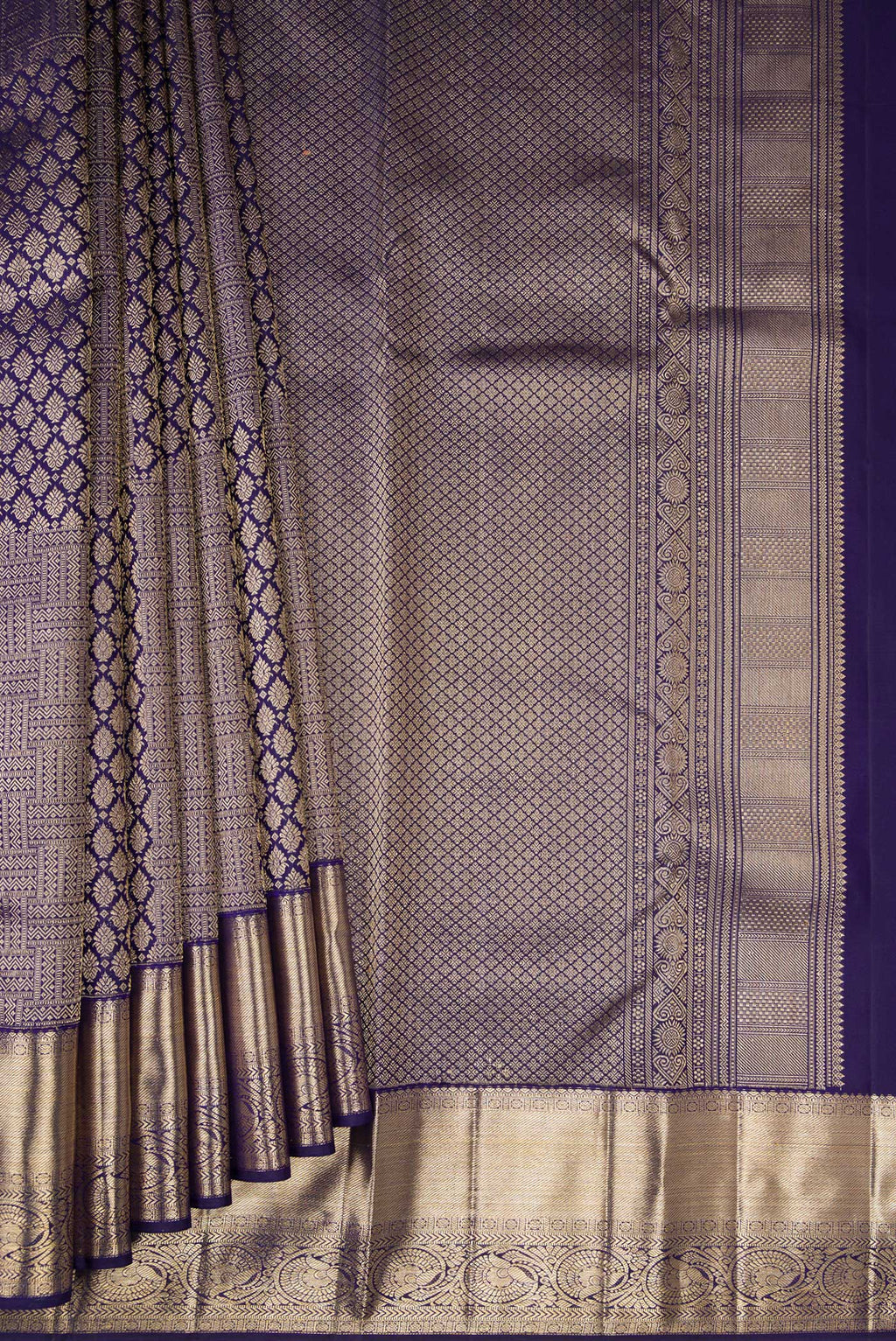 Pleats and pallu of Navy Blue Kanchipuram Silk Saree with Zari Brocade on the body and Zari Border. 