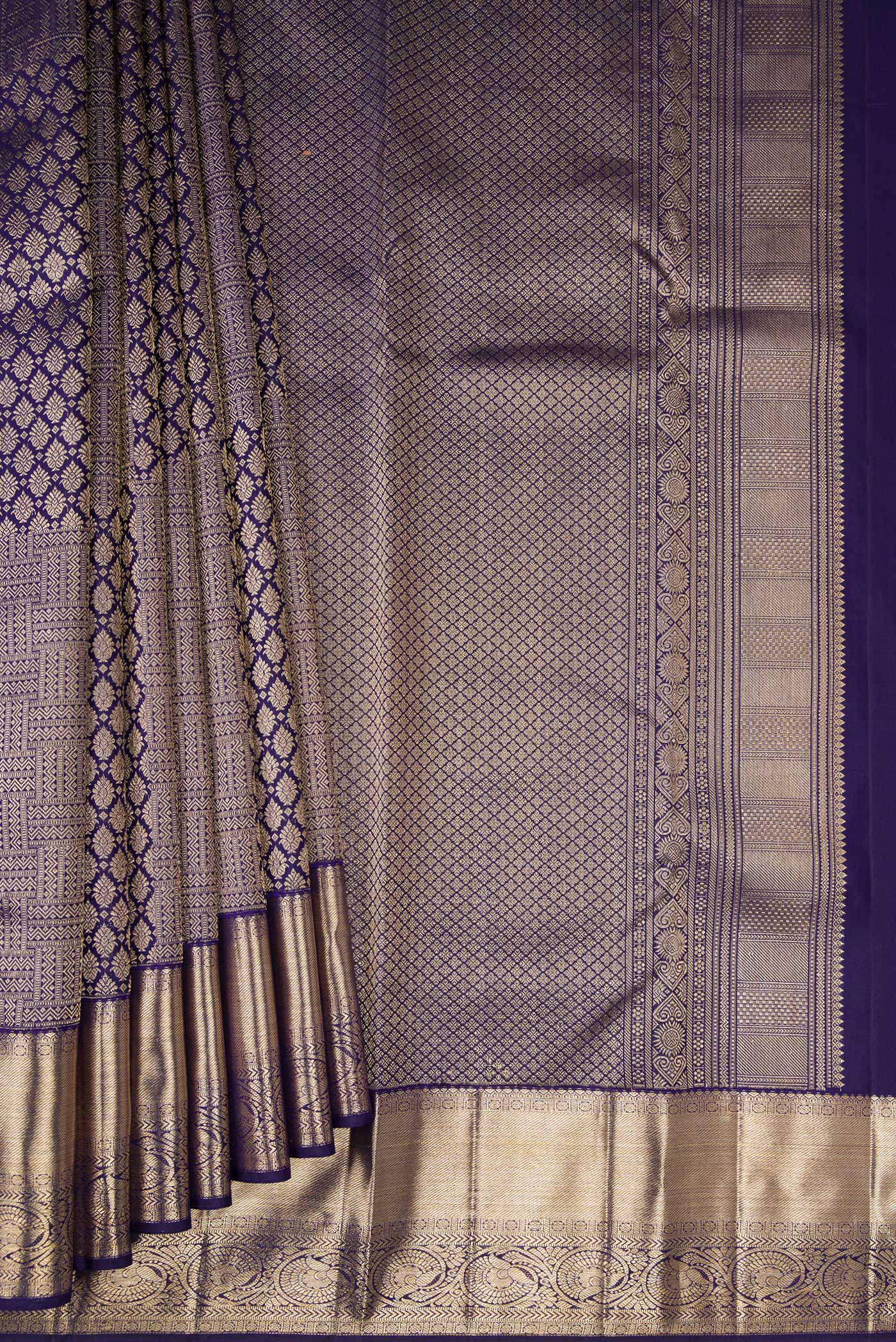 Pleats and pallu of Navy Blue Kanchipuram Silk Saree with Zari Brocade on the body and Zari Border. 