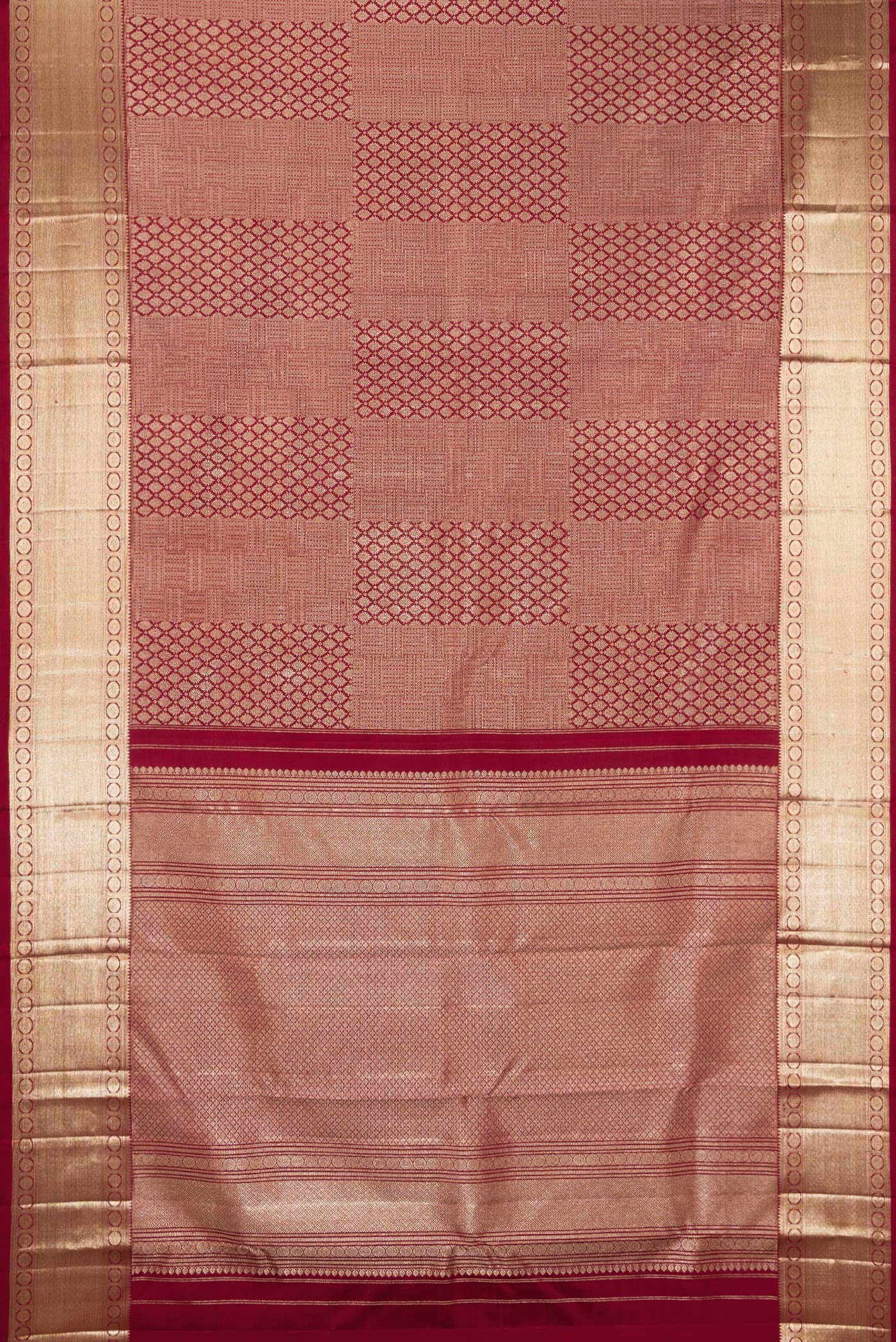 Flat view of Maroon Kanchipuram Silk Saree with Zari Brocade on the body and Zari Border. 