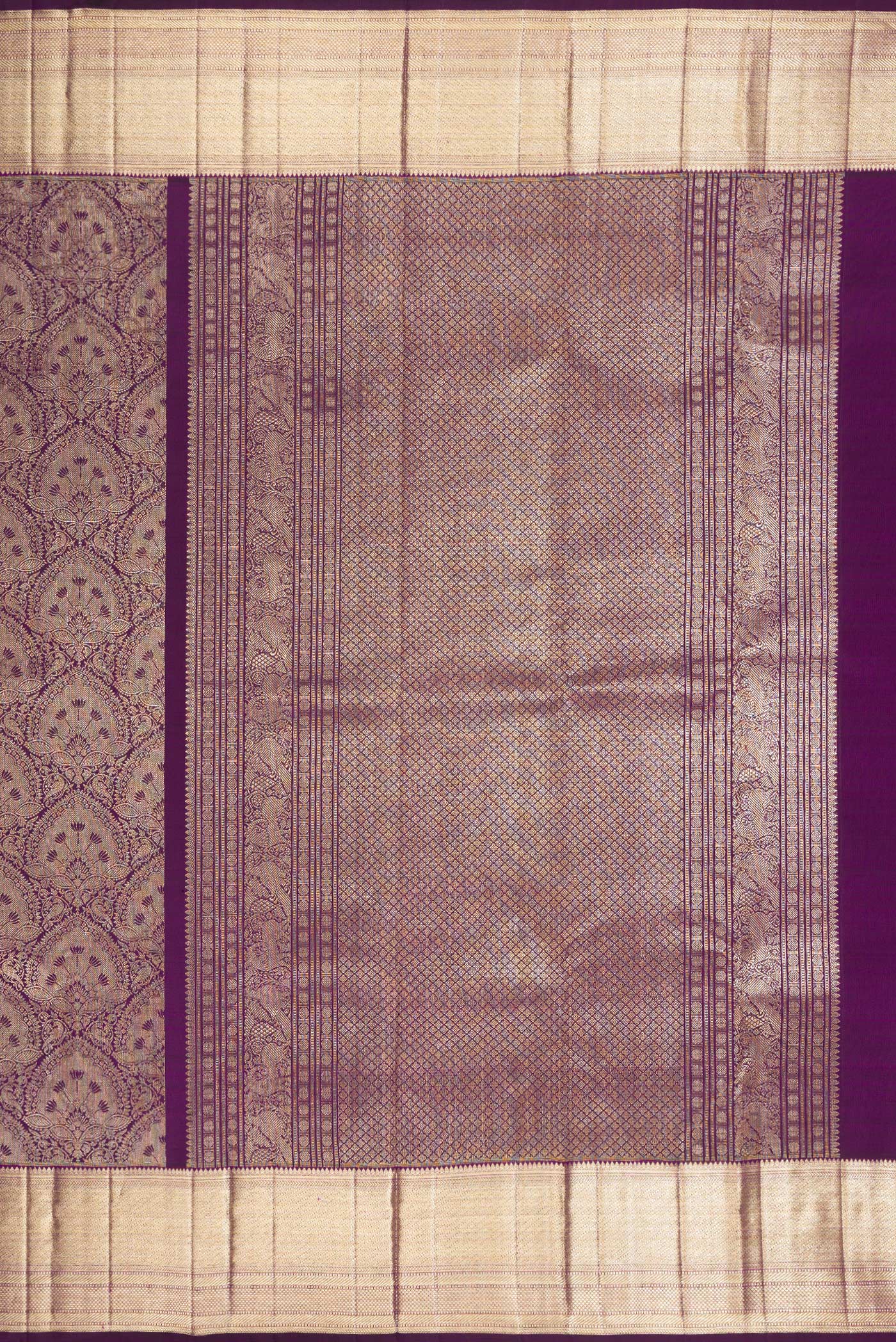 Close up image of the pallu of Purple Dual Tone Kanchipuram Silk Saree with Zari Brocade on the body and Zari Border. 