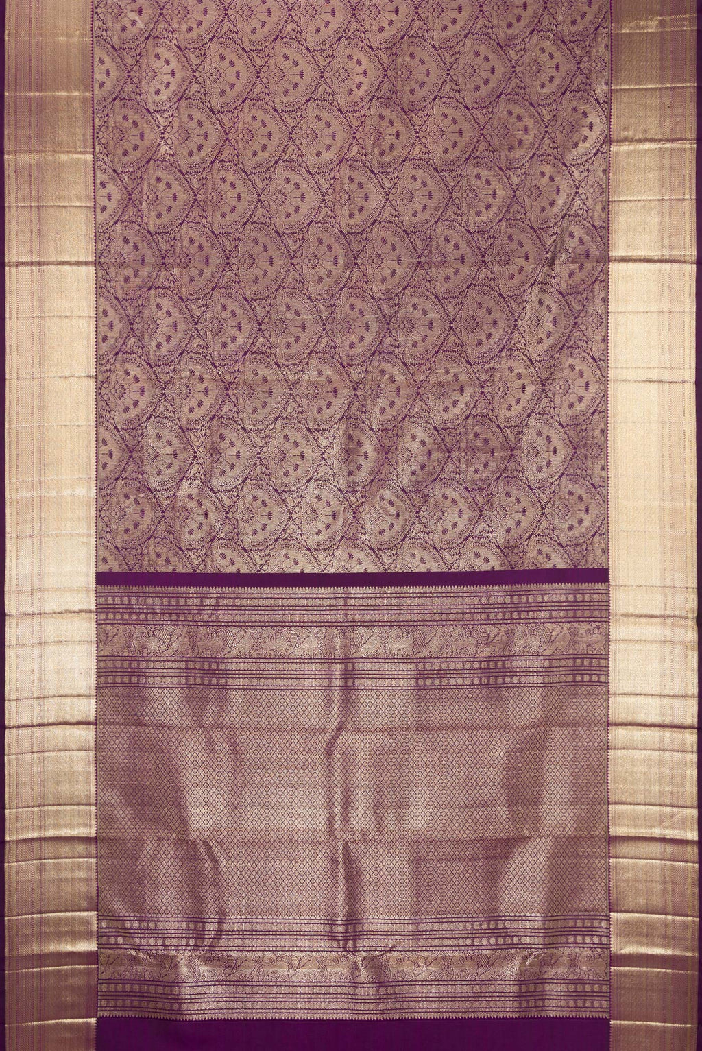 Flat view of Purple Dual Tone Kanchipuram Silk Saree with Zari Brocade on the body and Zari Border. 