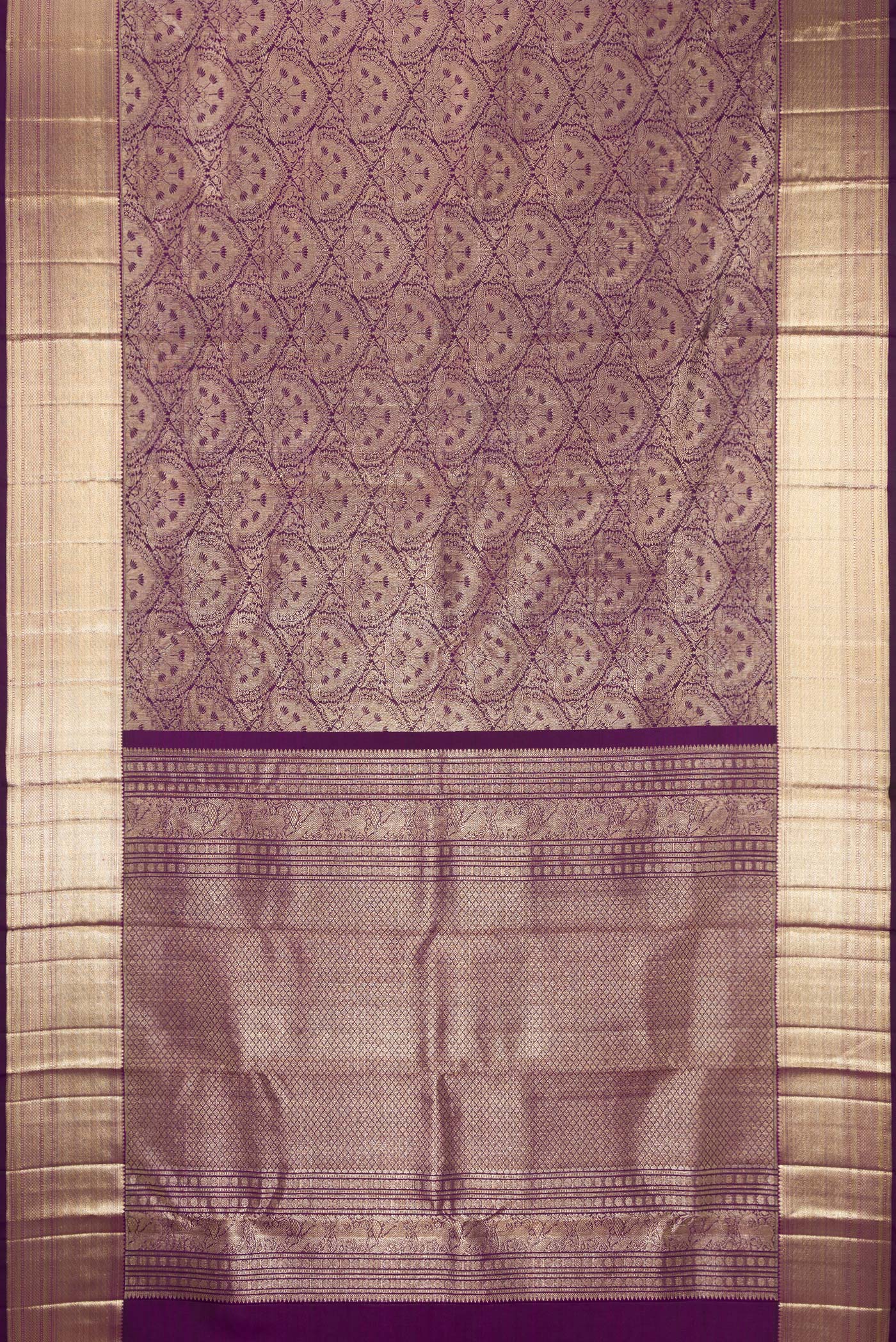 Flat view of Purple Dual Tone Kanchipuram Silk Saree with Zari Brocade on the body and Zari Border. 