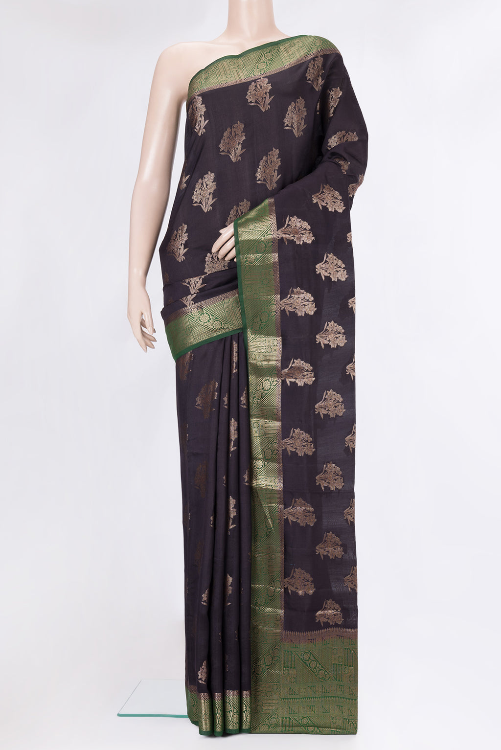 Black Tussar Silk Saree with Zari Butta on the body and Zari Border.  displayed on a mannequin