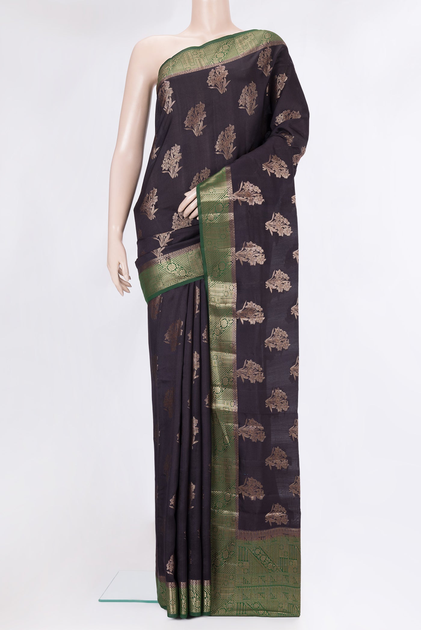 Black Tussar Silk Saree with Zari Butta on the body and Zari Border.  displayed on a mannequin