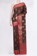 Brown Tussar Silk Saree with Zari Butta on the body and Zari Border.  displayed on a mannequin
