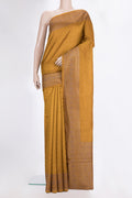 Pure Silk Mustard Tussar Saree with Zari Butta on the body and Zari Border.  displayed on a mannequin