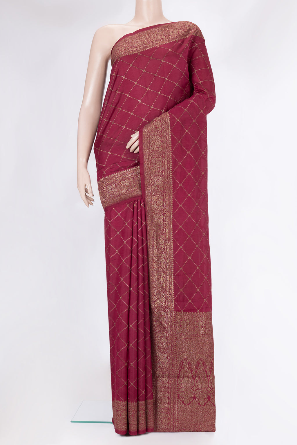 Dark Pink Tussar Silk Saree with Zari Butta on the body and Zari Border.  displayed on a mannequin