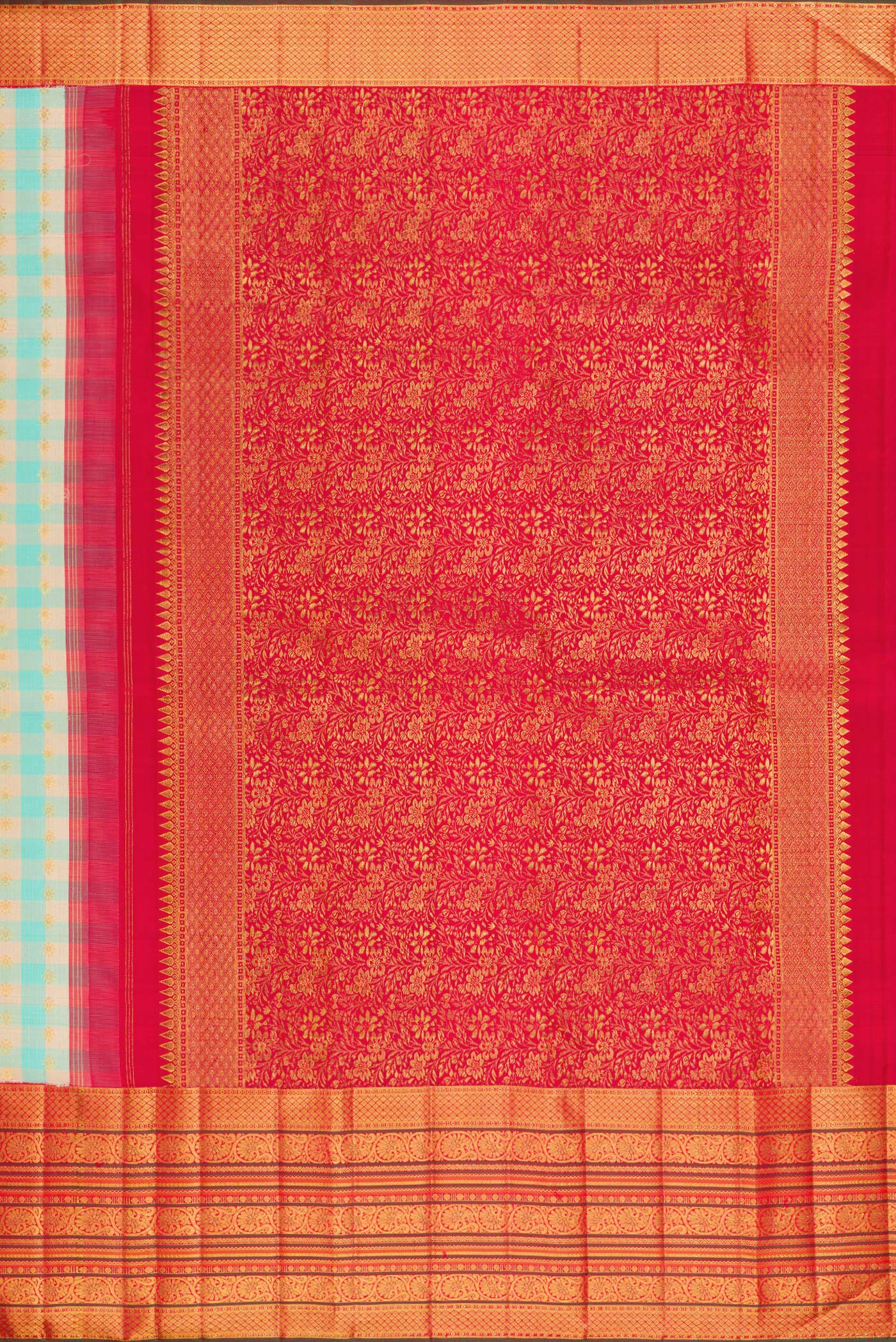 Close up image of the pallu of Sky Blue Kanchipuram Silk Saree with Checked design on the body and Zari Border. 