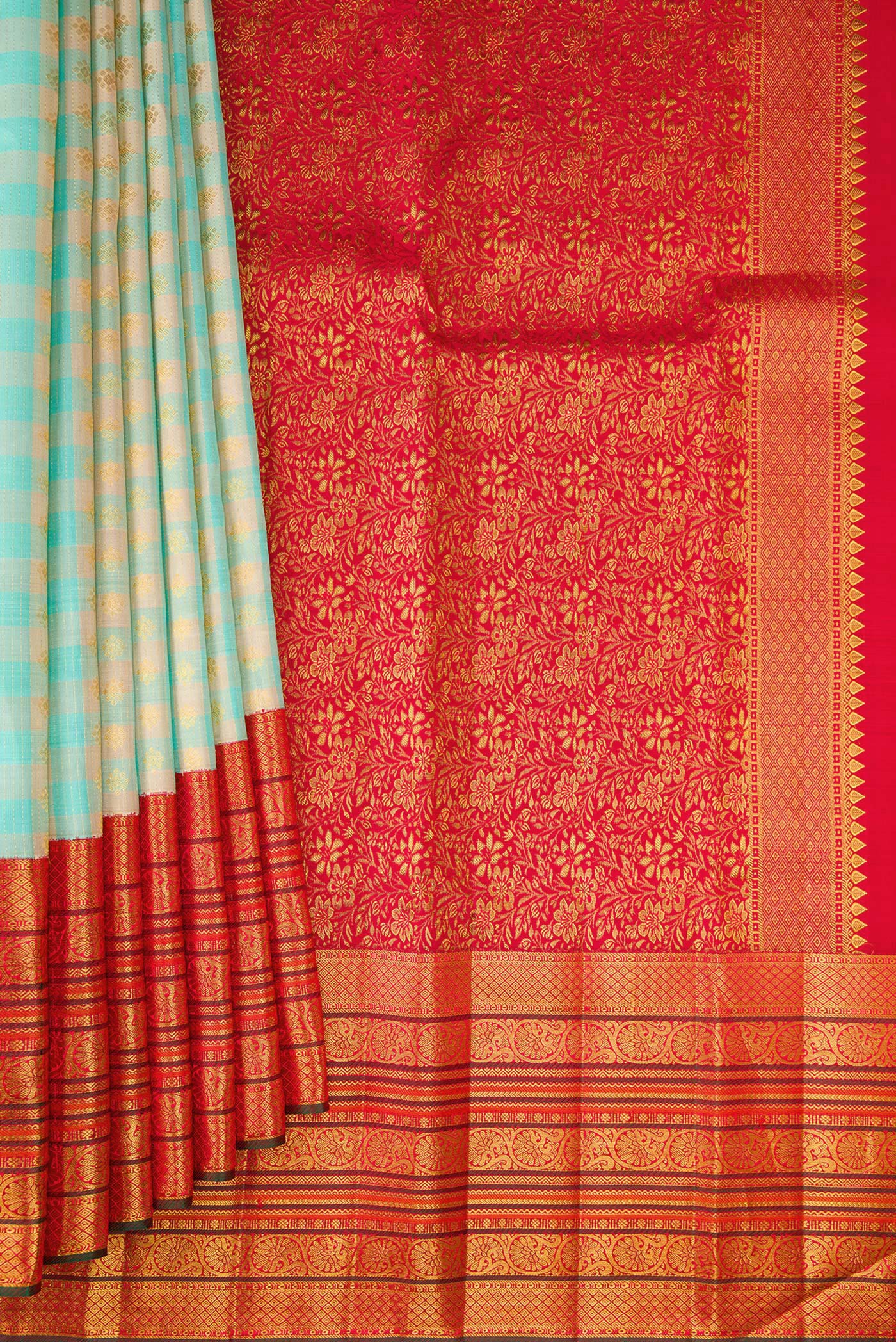 Pleats and pallu of Sky Blue Kanchipuram Silk Saree with Checked design on the body and Zari Border. 