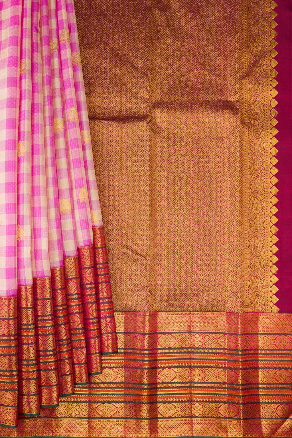 Pleats and pallu of Multi Color Kanchipuram Silk Saree with Checked design on the body and Fancy Border. 