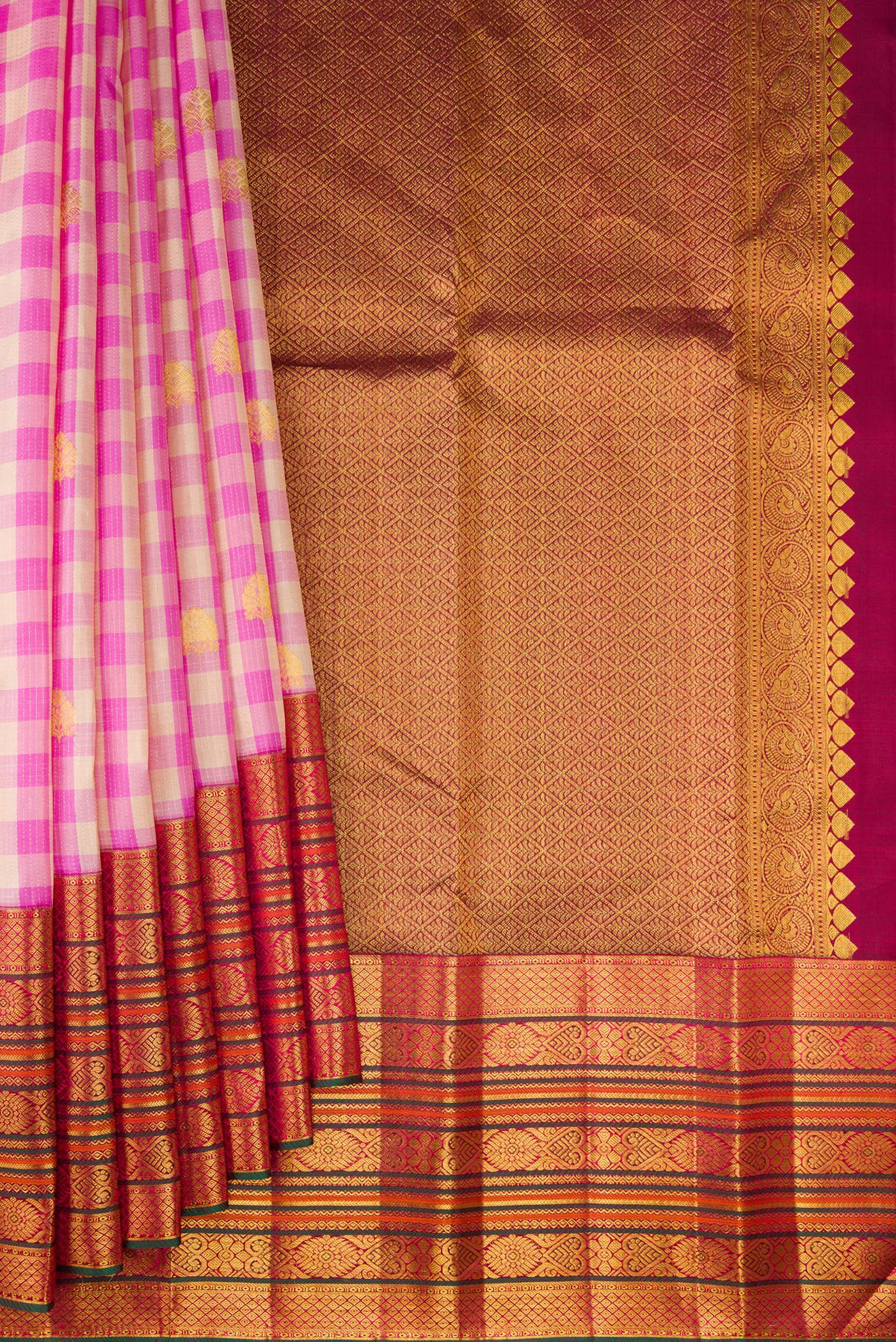 Pleats and pallu of Multi Color Kanchipuram Silk Saree with Checked design on the body and Fancy Border. 
