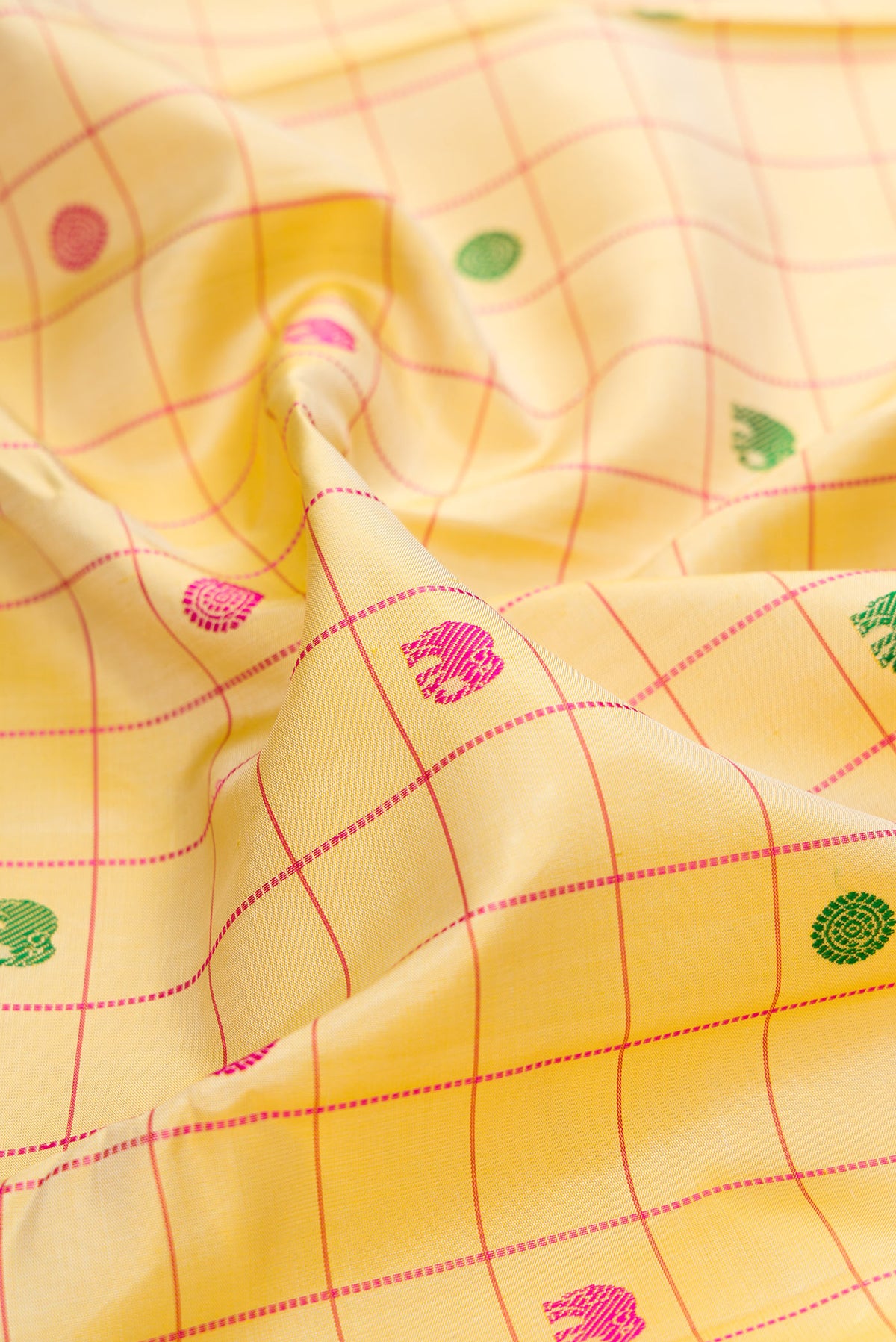 Close up of Pure Silk Pure Zari Sandal Dual Tone Kanjivaram Saree with Checked design on the body and Zari Border.  displaying folds