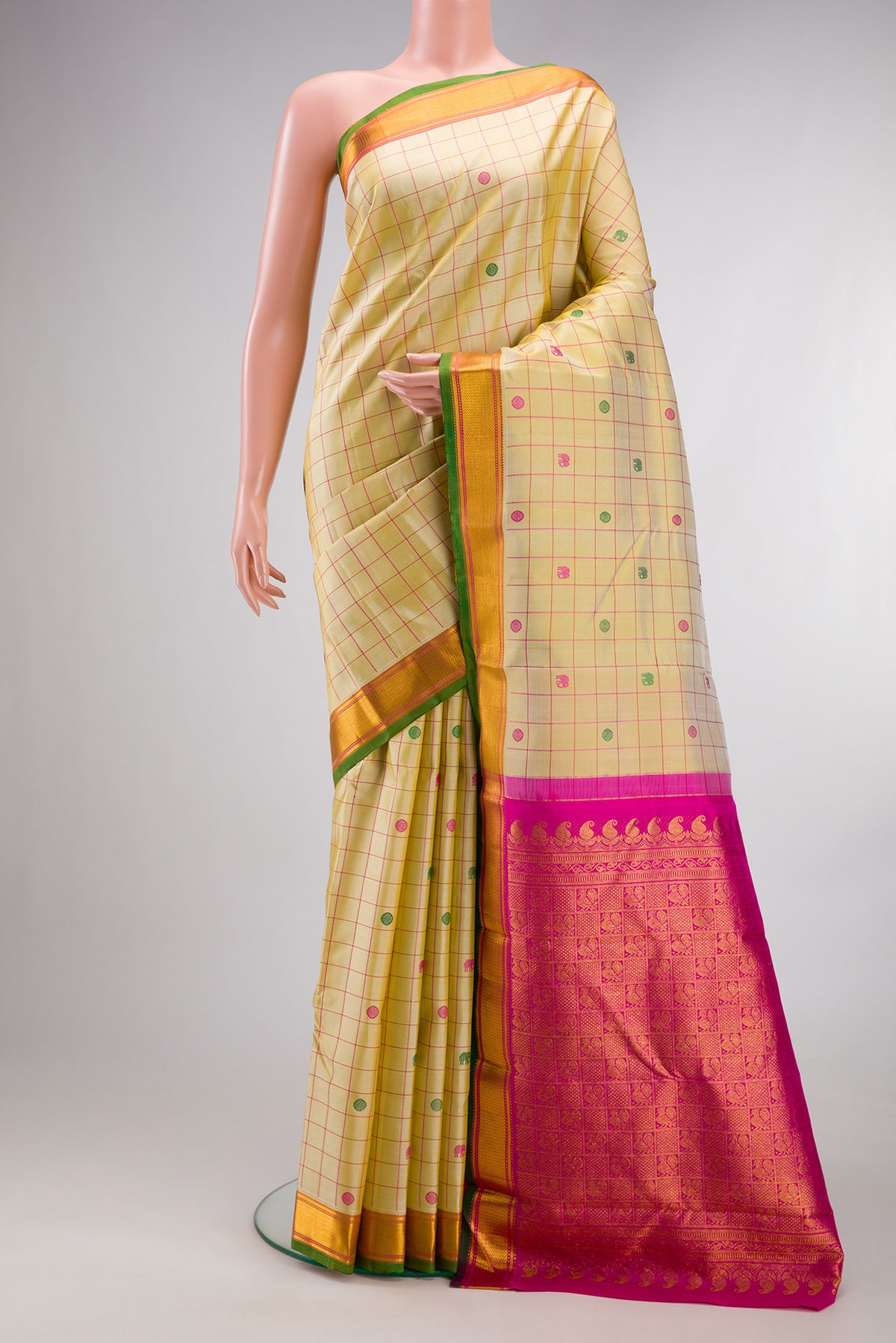 Pure Silk Pure Zari Sandal Dual Tone Kanjivaram Saree with Checked design on the body and Zari Border.  displayed on a mannequin