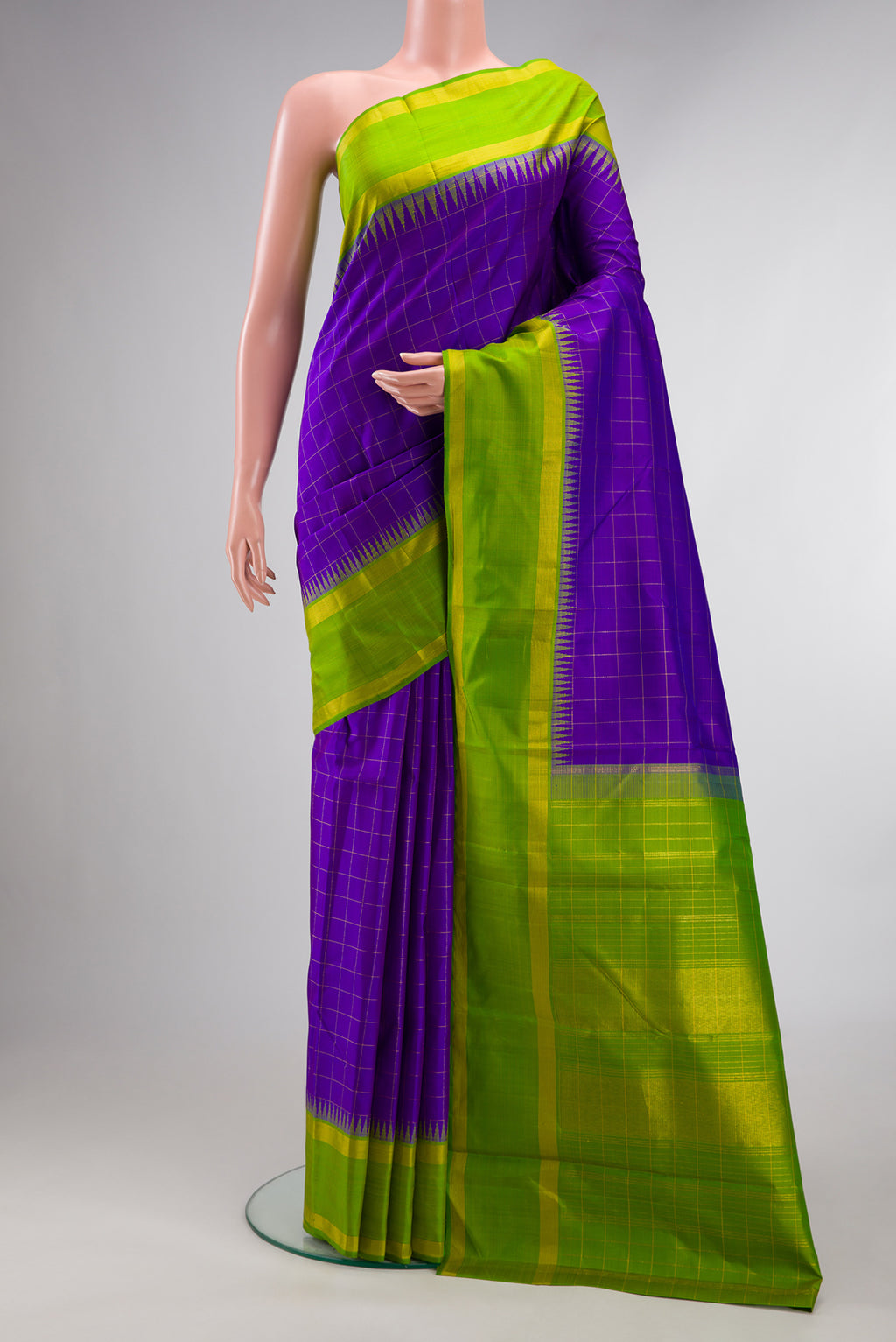 Pure Silk Violet Dual Tone Kanjivaram Saree with Checked design on the body and Zari Border.  displayed on a mannequin