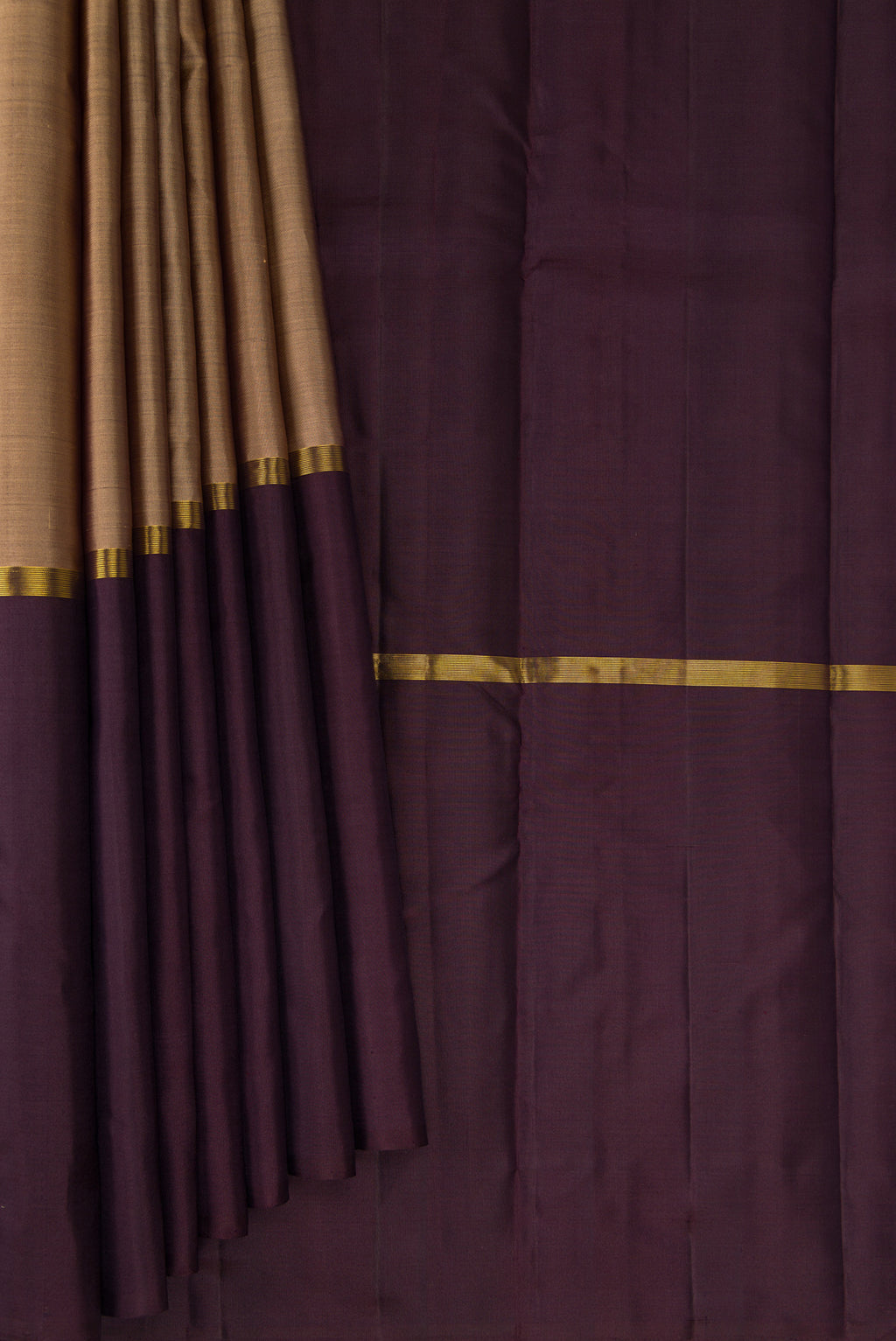 Pleats and pallu of Pure Silk Pure Zari Dark Beige Kanjivaram Saree with Plain Body and Ganga Jamuna Border. 