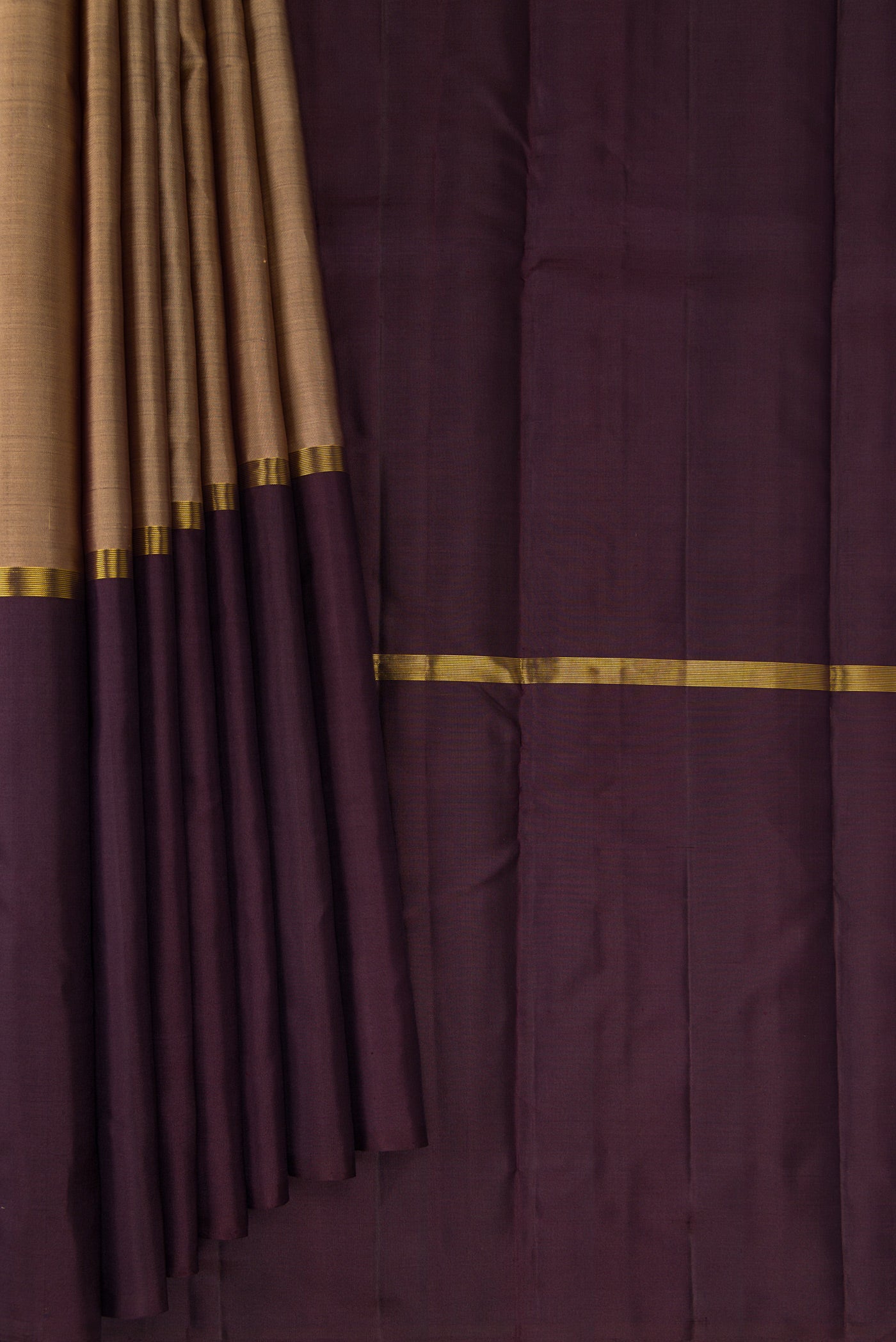 Pleats and pallu of Pure Silk Pure Zari Dark Beige Kanjivaram Saree with Plain Body and Ganga Jamuna Border. 