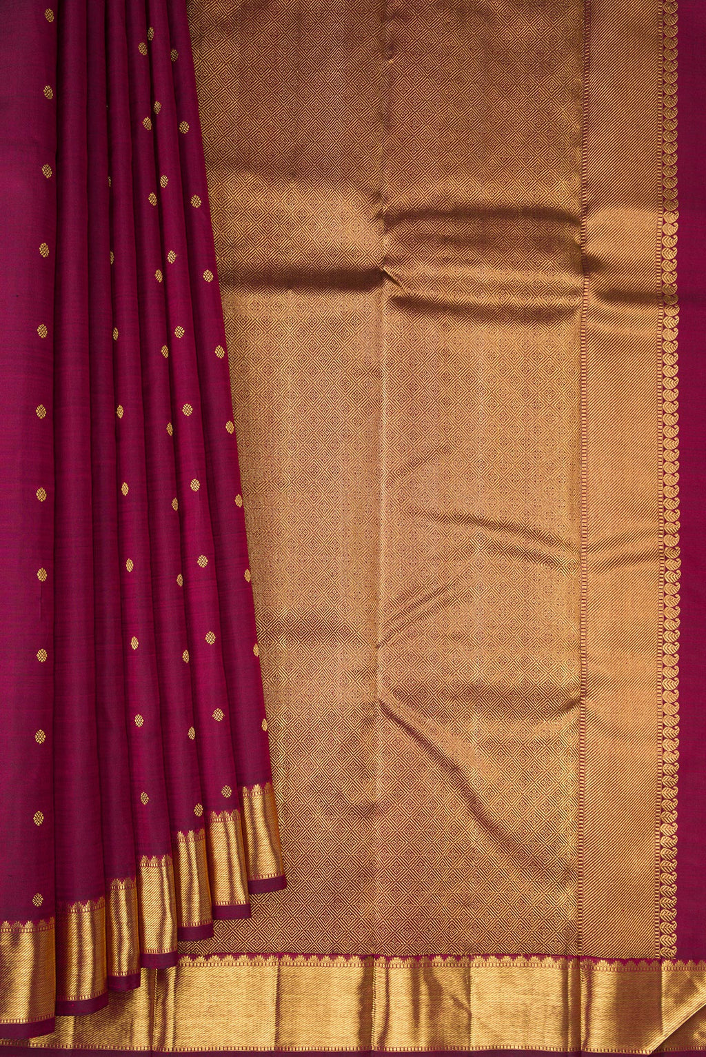 Pleats and pallu of Pure Silk Pure Zari Maroon Dual Tone Kanjivaram Saree with Zari Butta on the body and Zari Border. 
