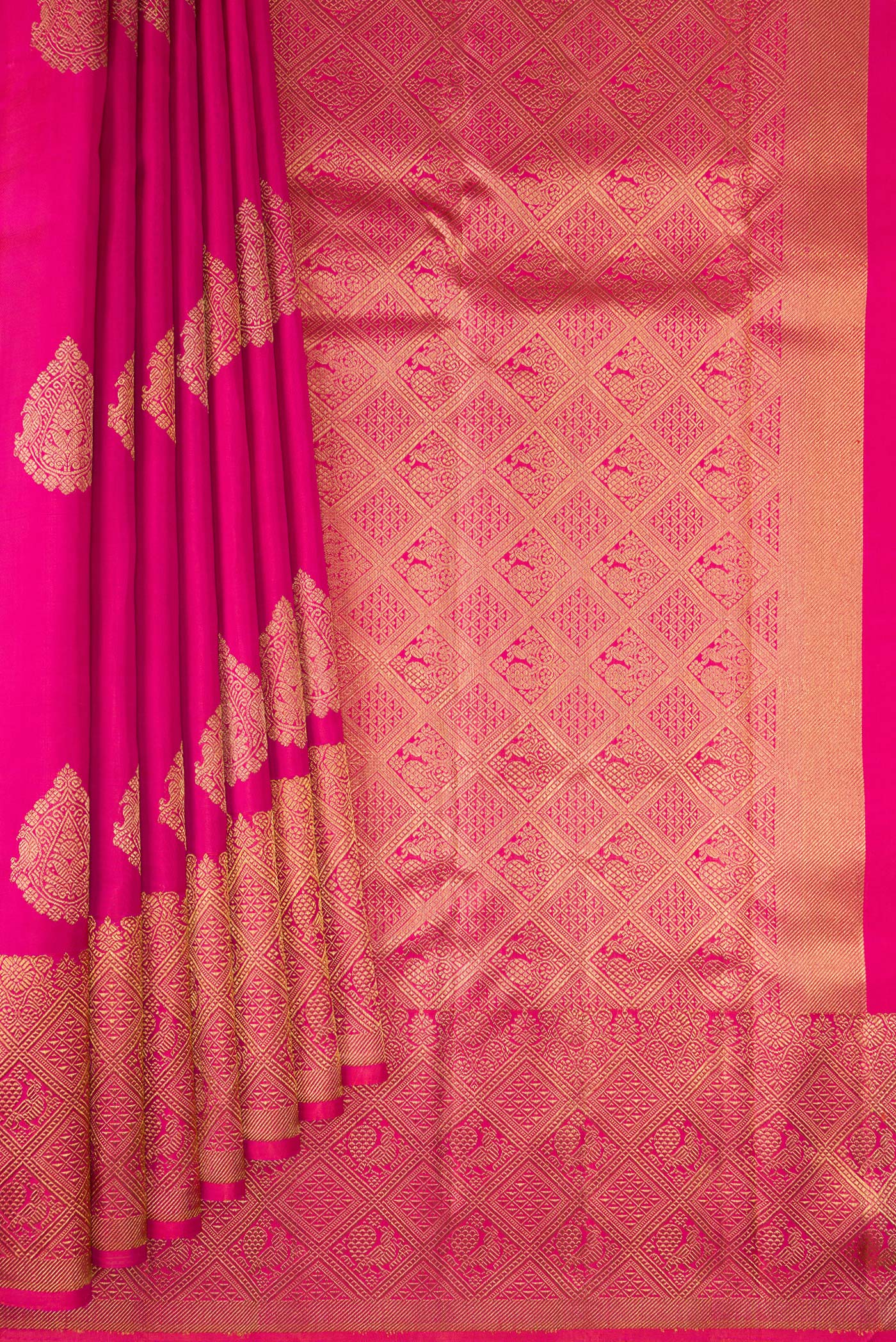 Pleats and pallu of Pure Silk Pure Zari Pink Kanjivaram Saree with Zari Butta on the body and Zari Border. 