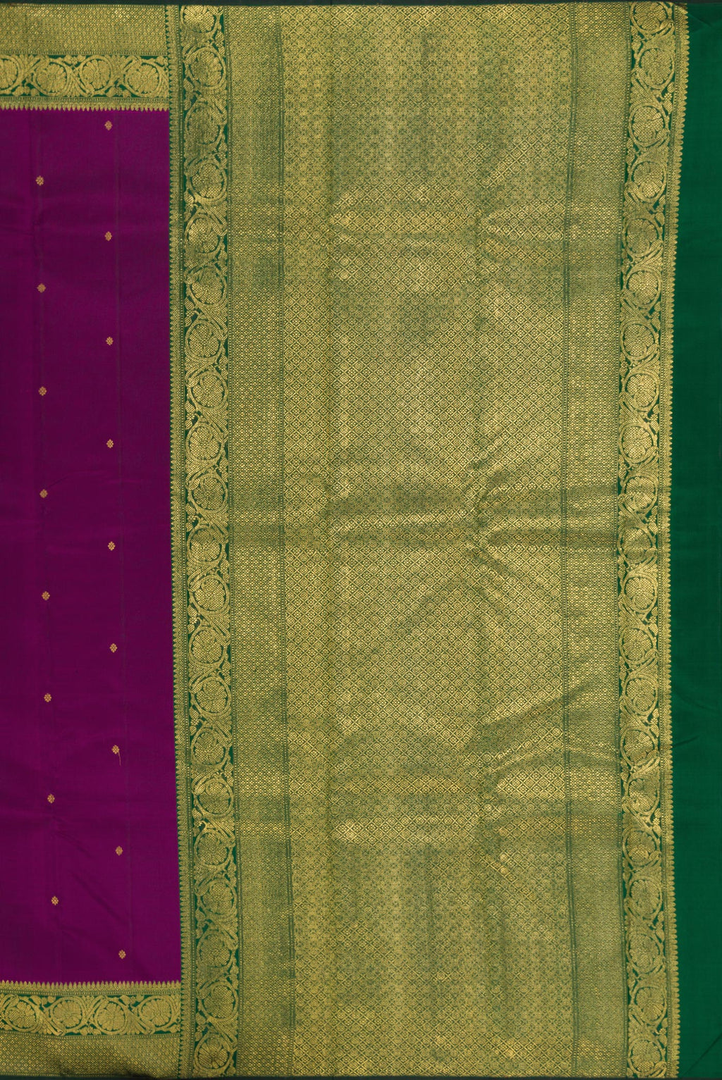 Close up image of the pallu of Pure Silk Pure Zari Purple Kanjivaram Saree with Zari Butta on the body and Zari Border. 