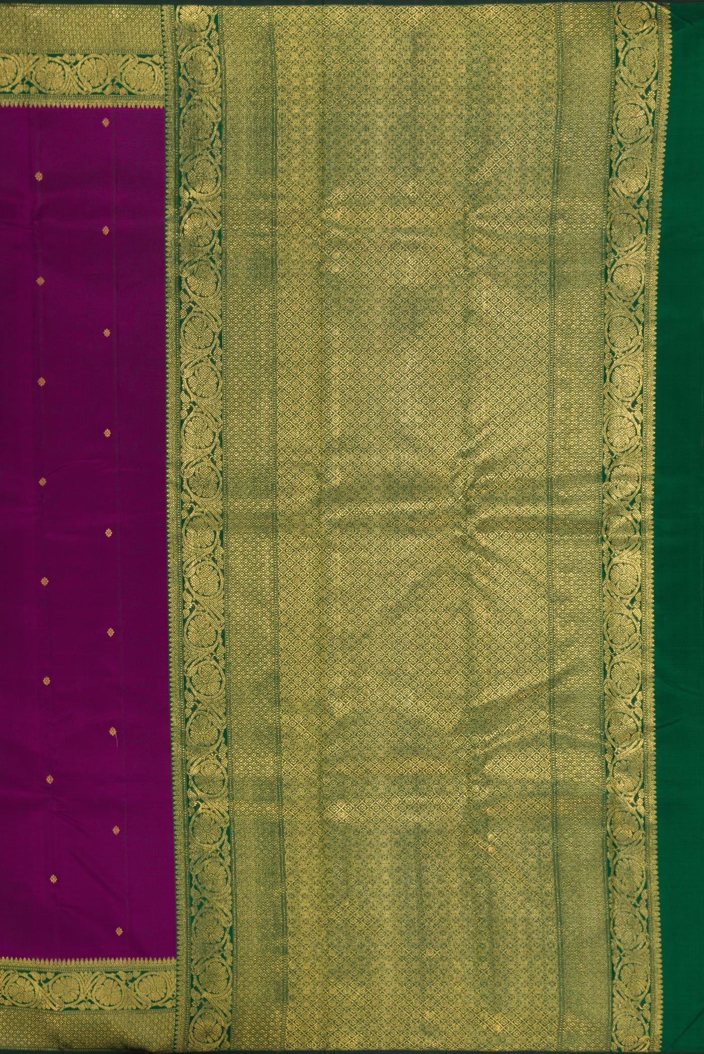 Close up image of the pallu of Pure Silk Pure Zari Purple Kanjivaram Saree with Zari Butta on the body and Zari Border. 