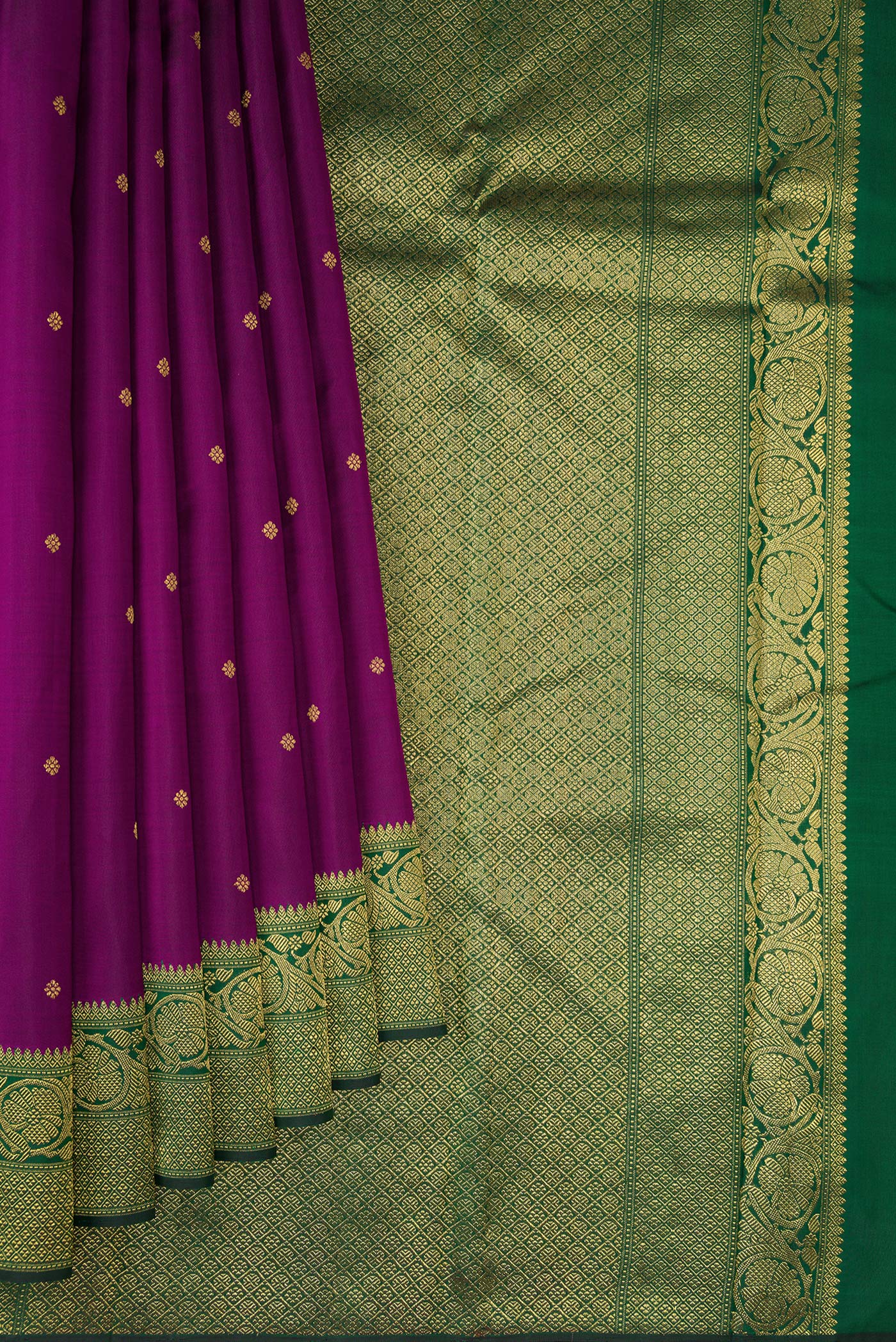 Pleats and pallu of Pure Silk Pure Zari Purple Kanjivaram Saree with Zari Butta on the body and Zari Border. 