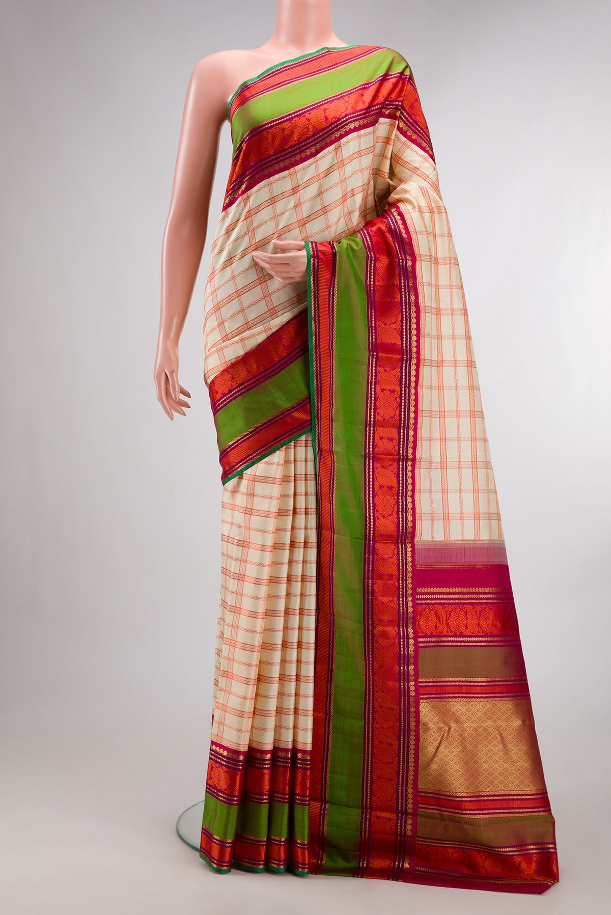Pure Silk Pure Zari Sandal Kanchipuram Saree with Checked design on the body and Zari And Thread Border.  displayed on a mannequin