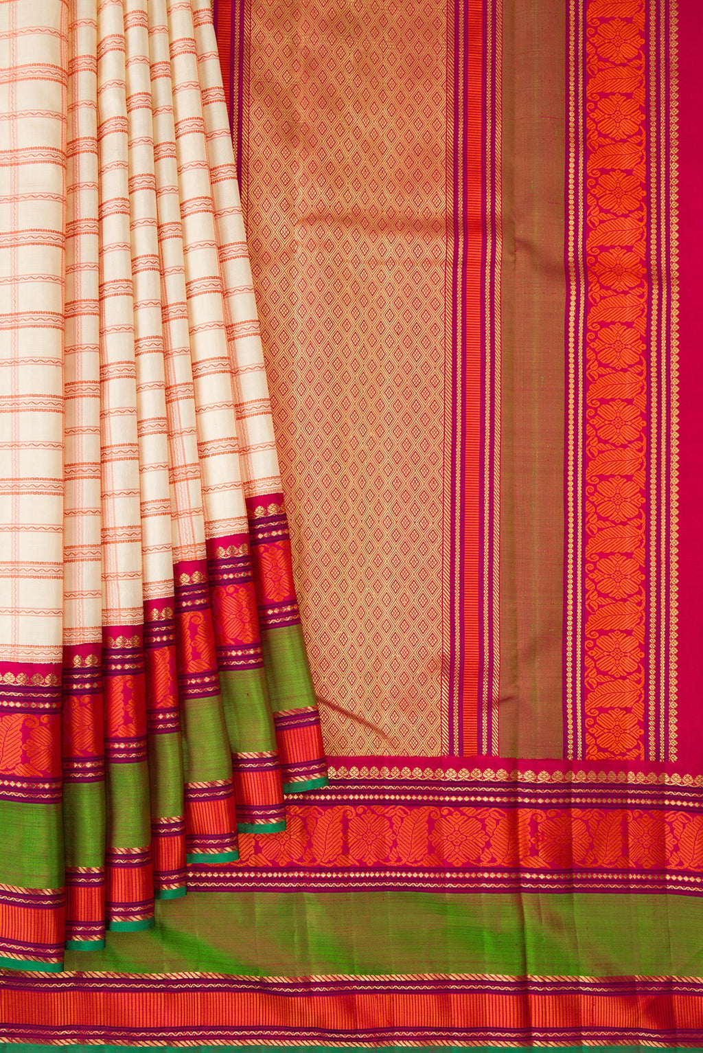 Pleats and pallu of Pure Silk Pure Zari Sandal Kanchipuram Saree with Checked design on the body and Zari And Thread Border. 