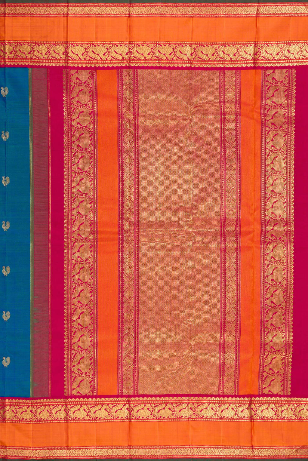 Close up image of the pallu of Pure Silk Pure Zari Peacock Blue Kanjivaram Saree with Zari Butta on the body and Zari Border. 