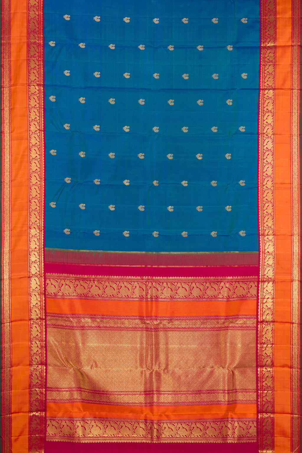 Flat view of Pure Silk Pure Zari Peacock Blue Kanjivaram Saree with Zari Butta on the body and Zari Border. 