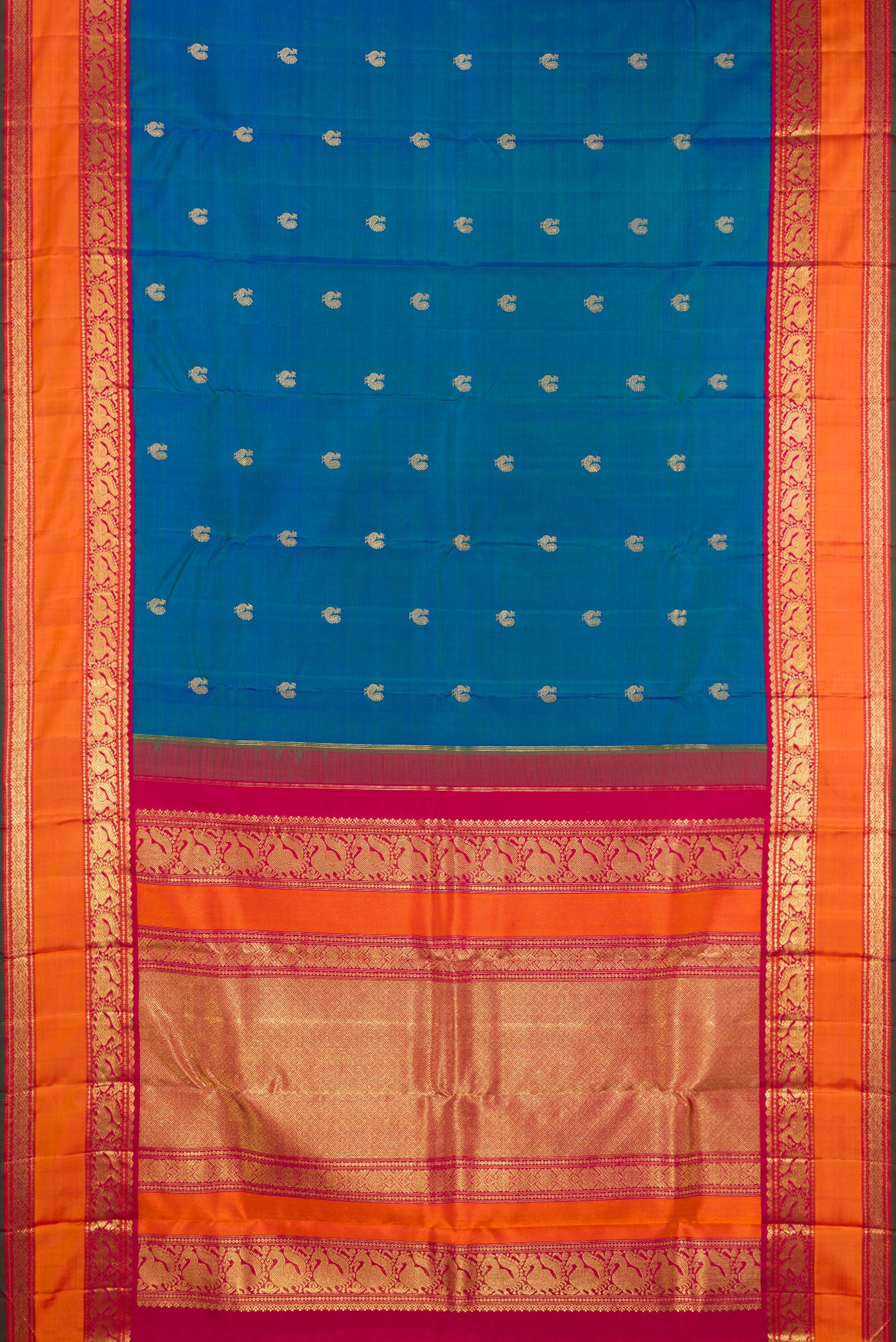 Flat view of Pure Silk Pure Zari Peacock Blue Kanjivaram Saree with Zari Butta on the body and Zari Border. 
