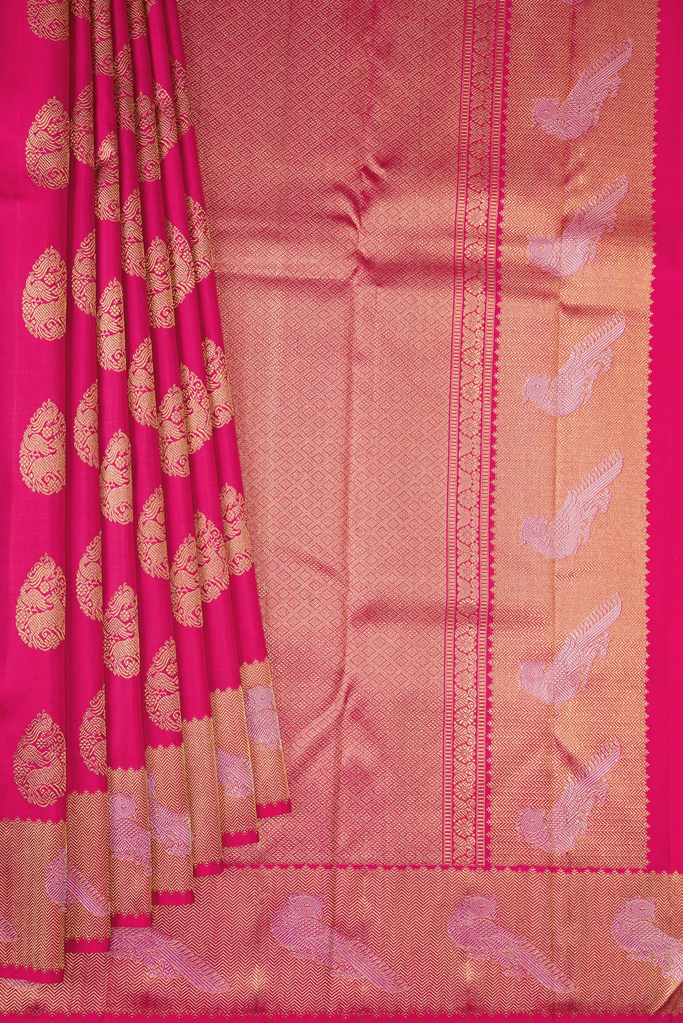 Pleats and pallu of Pure Silk Pure Zari Pink Kanjivaram Saree with Zari Butta on the body and Fancy Border. 