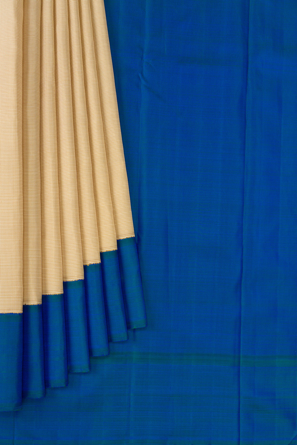 Pleats and pallu of Beige Kanjivaram Silk Saree with Checked design on the body and Plain Border. 