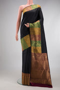 Pure Silk Pure Zari Black Kanjivaram Saree with Plain Body and Fancy Border.  displayed on a mannequin