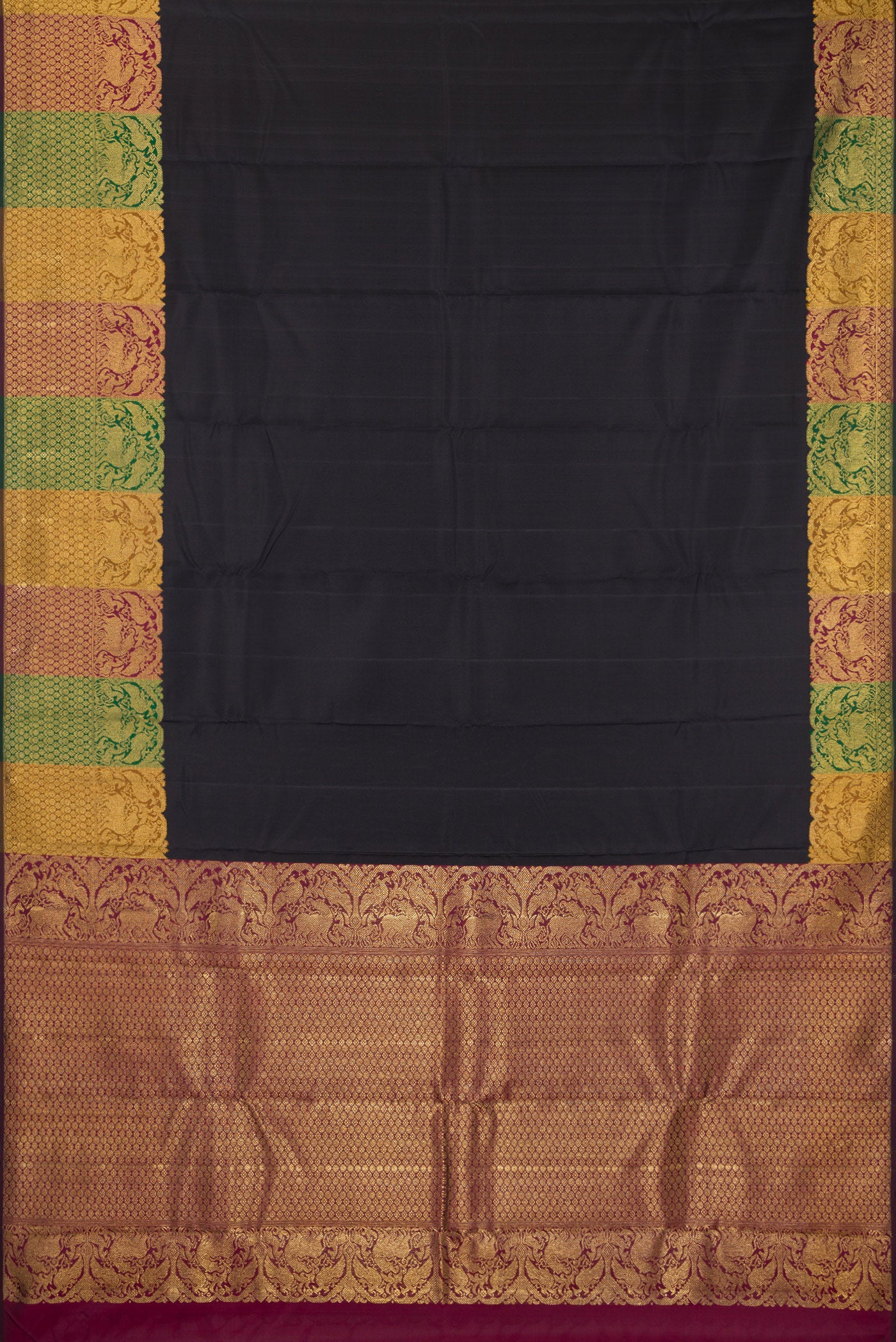 Flat view of Pure Silk Pure Zari Black Kanjivaram Saree with Plain Body and Fancy Border. 
