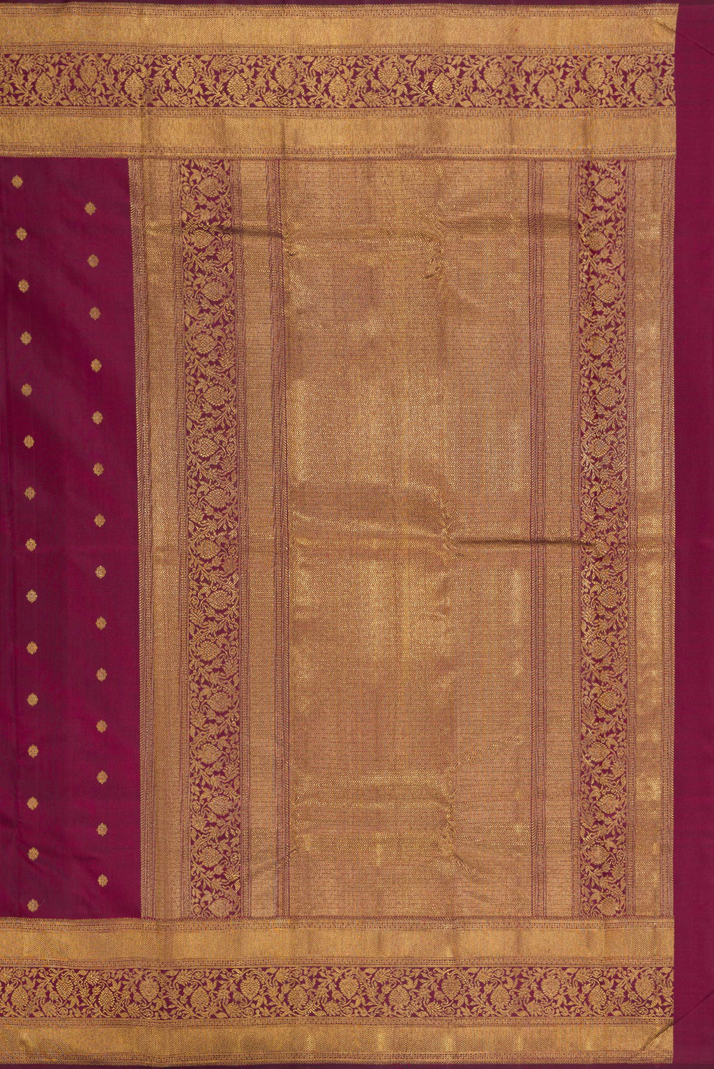 Close up image of the pallu of Pure Silk Pure Zari Maroon Kanjivaram Saree with Zari Butta on the body and Fancy Border. 