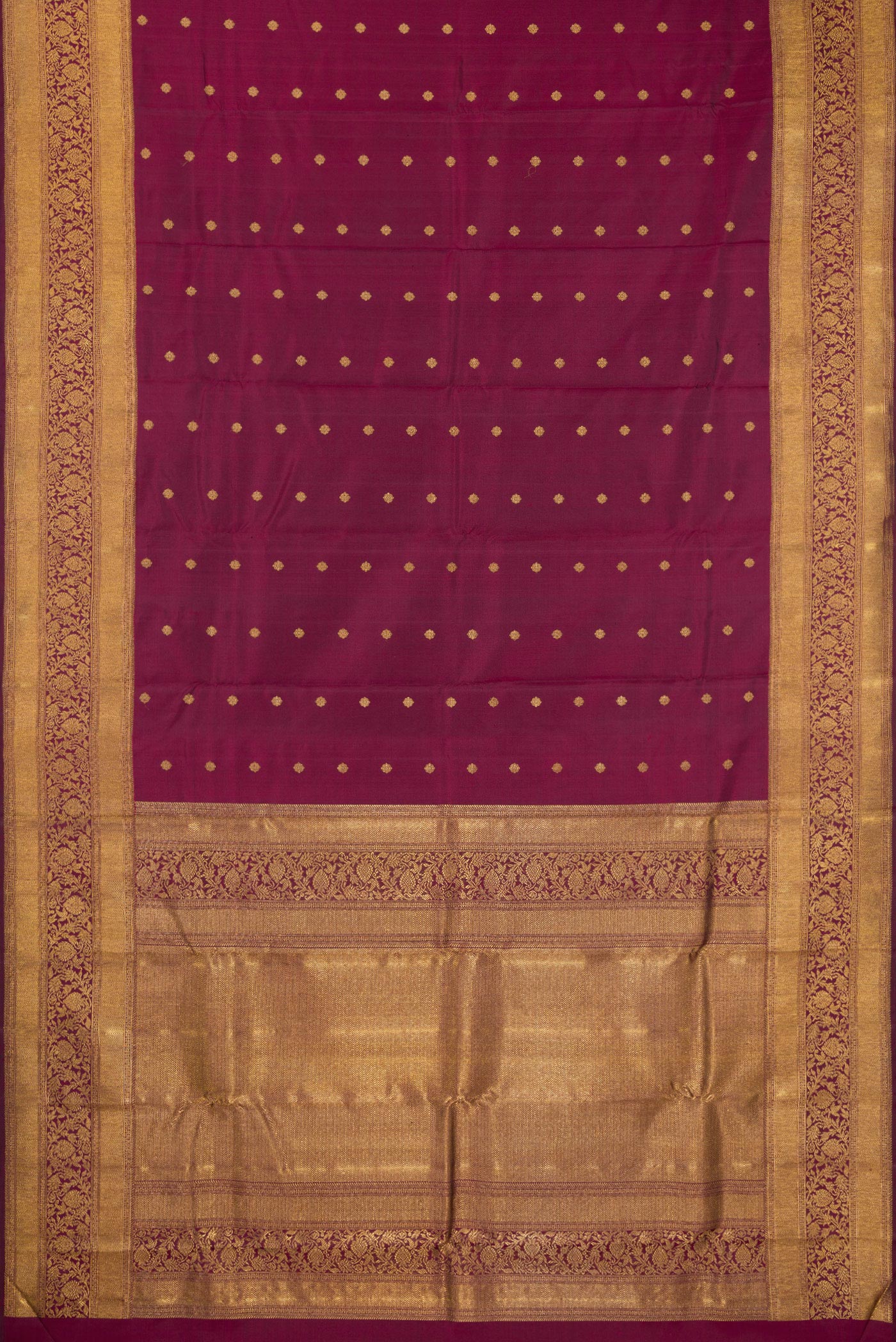 Flat view of Pure Silk Pure Zari Maroon Kanjivaram Saree with Zari Butta on the body and Fancy Border. 