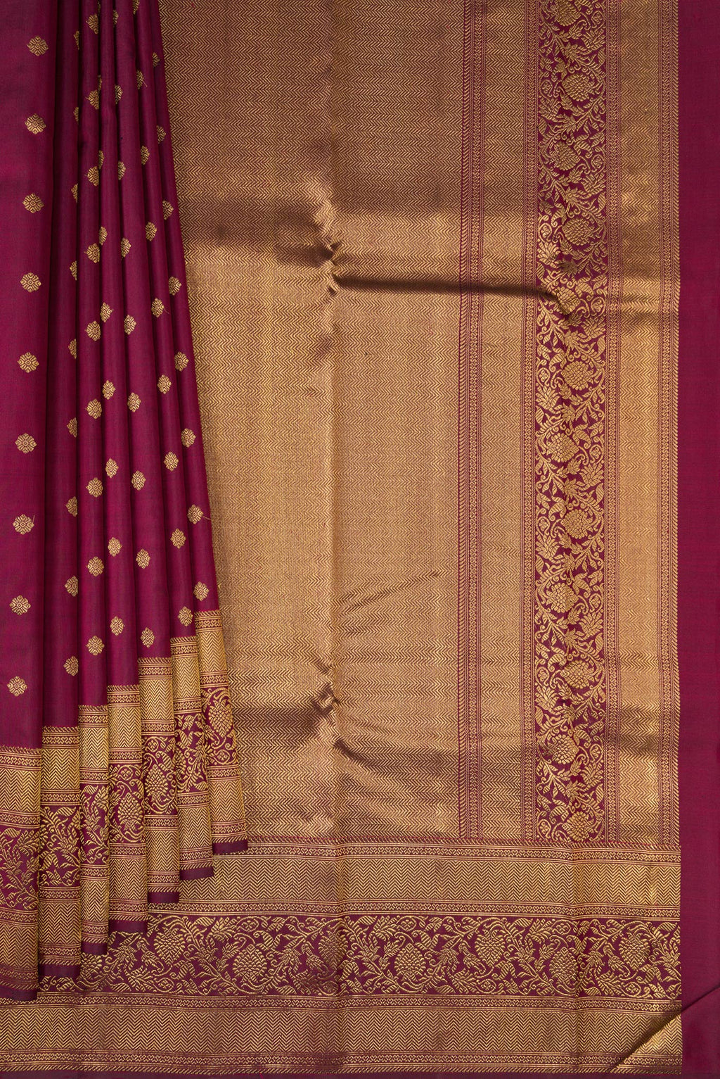 Pleats and pallu of Pure Silk Pure Zari Maroon Kanjivaram Saree with Zari Butta on the body and Fancy Border. 