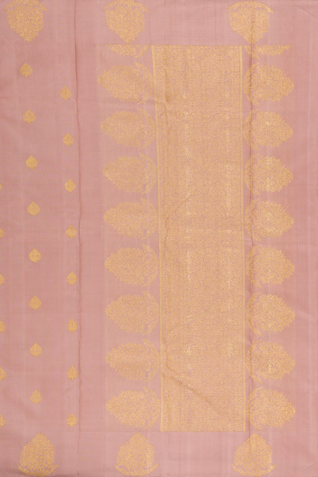 Close up image of the pallu of Pure Silk Pure Zari Rose Gold Kanjivaram Saree with Zari Butta on the body and Fancy Border. 