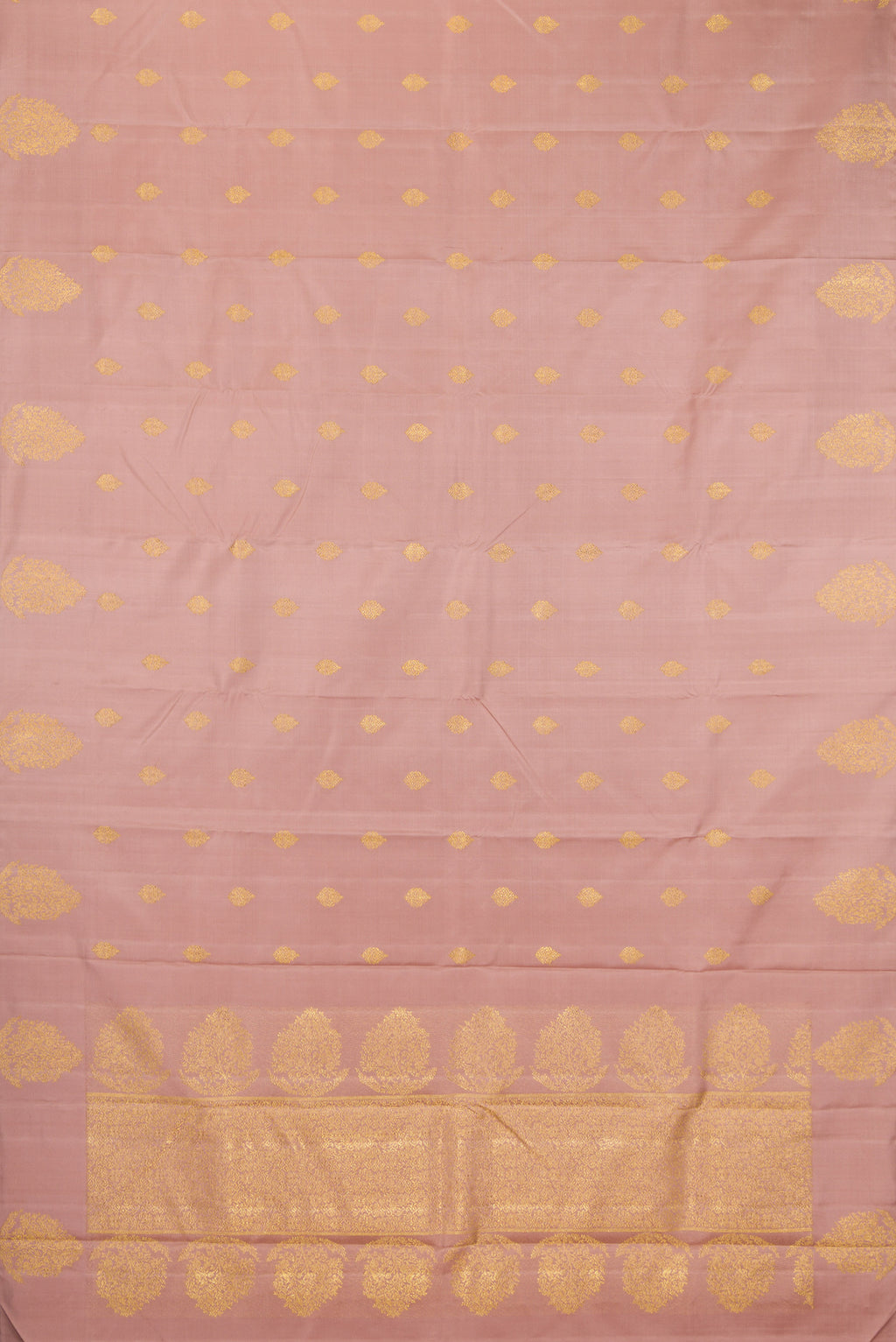 Flat view of Pure Silk Pure Zari Rose Gold Kanjivaram Saree with Zari Butta on the body and Fancy Border. 